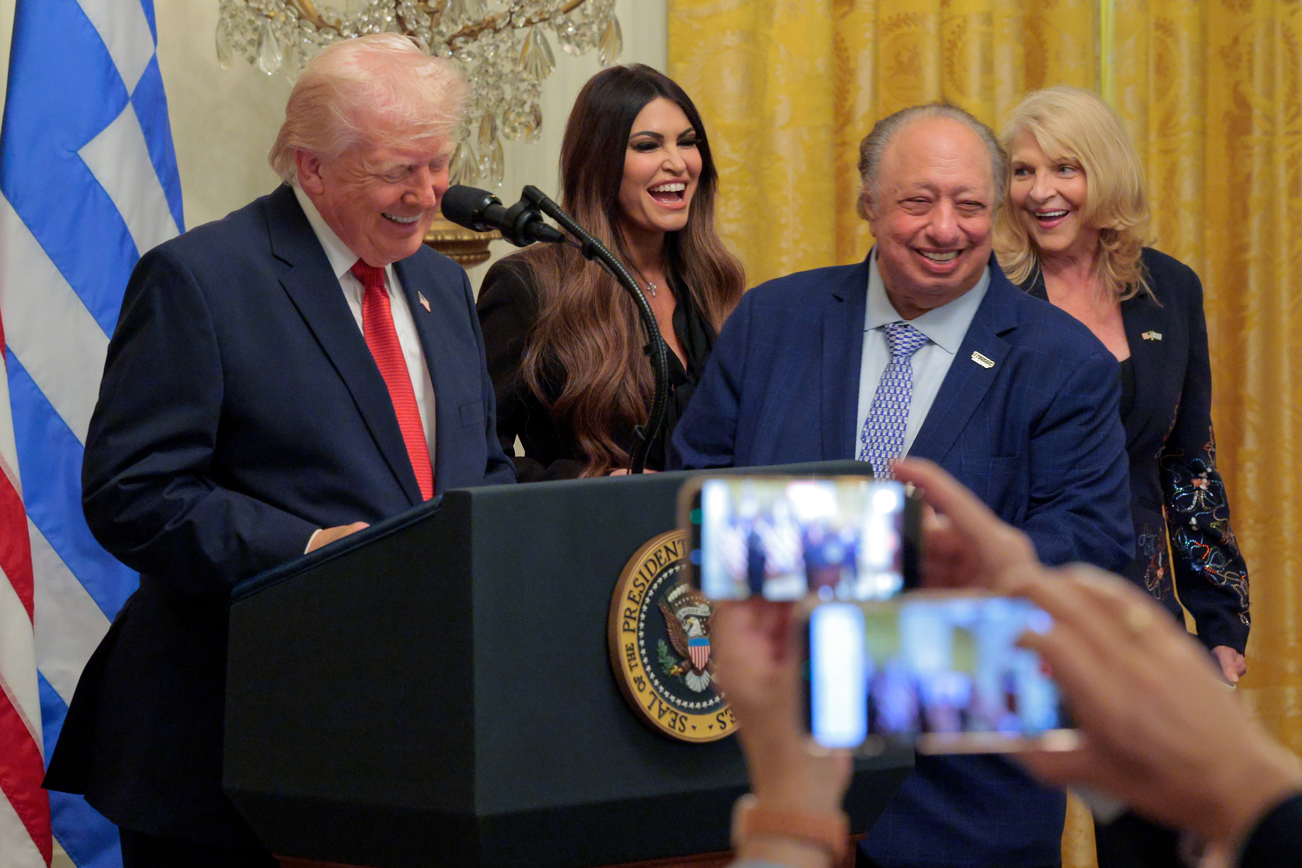 John and Margo Catsimatidis smiled as Trump addressed guests during the White House celebration, reflecting the family's continued presence at events hosted by the president. | Source: Getty Images
