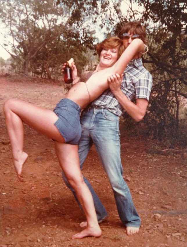 Candice Swanepoel's parents share a playful moment outdoors in this throwback photograph, with her mother laughing as her father holds her in his arms. The family snapshot offers a glimpse into the relaxed, outdoorsy life that surrounded Candice during her childhood in South Africa.  | Source: Instagram/candiceswanepoel