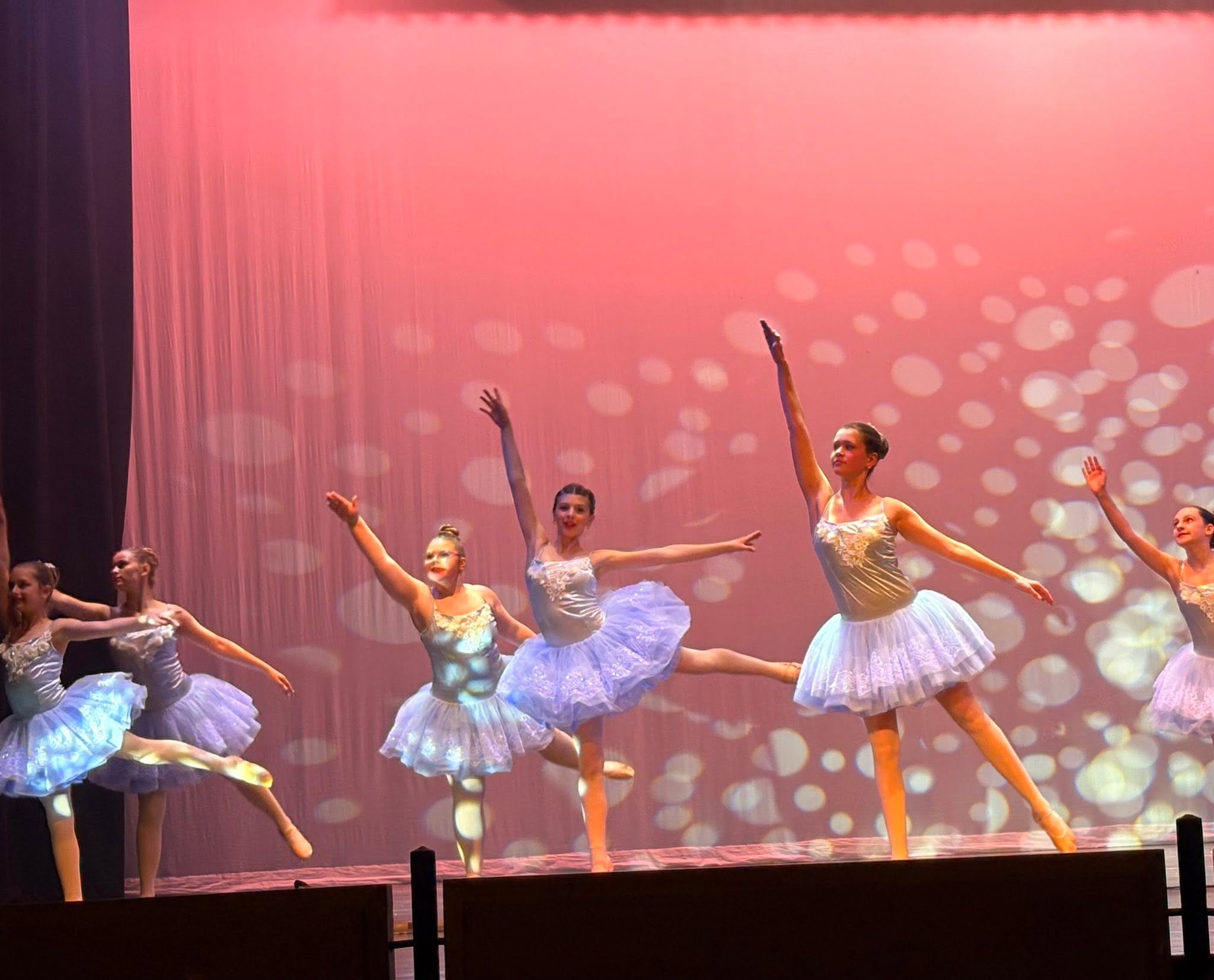 One of Lindsey Dash's kids performing on stage in an image posted on May 10, 2026. | Source: Facebook/Lindsey Dash