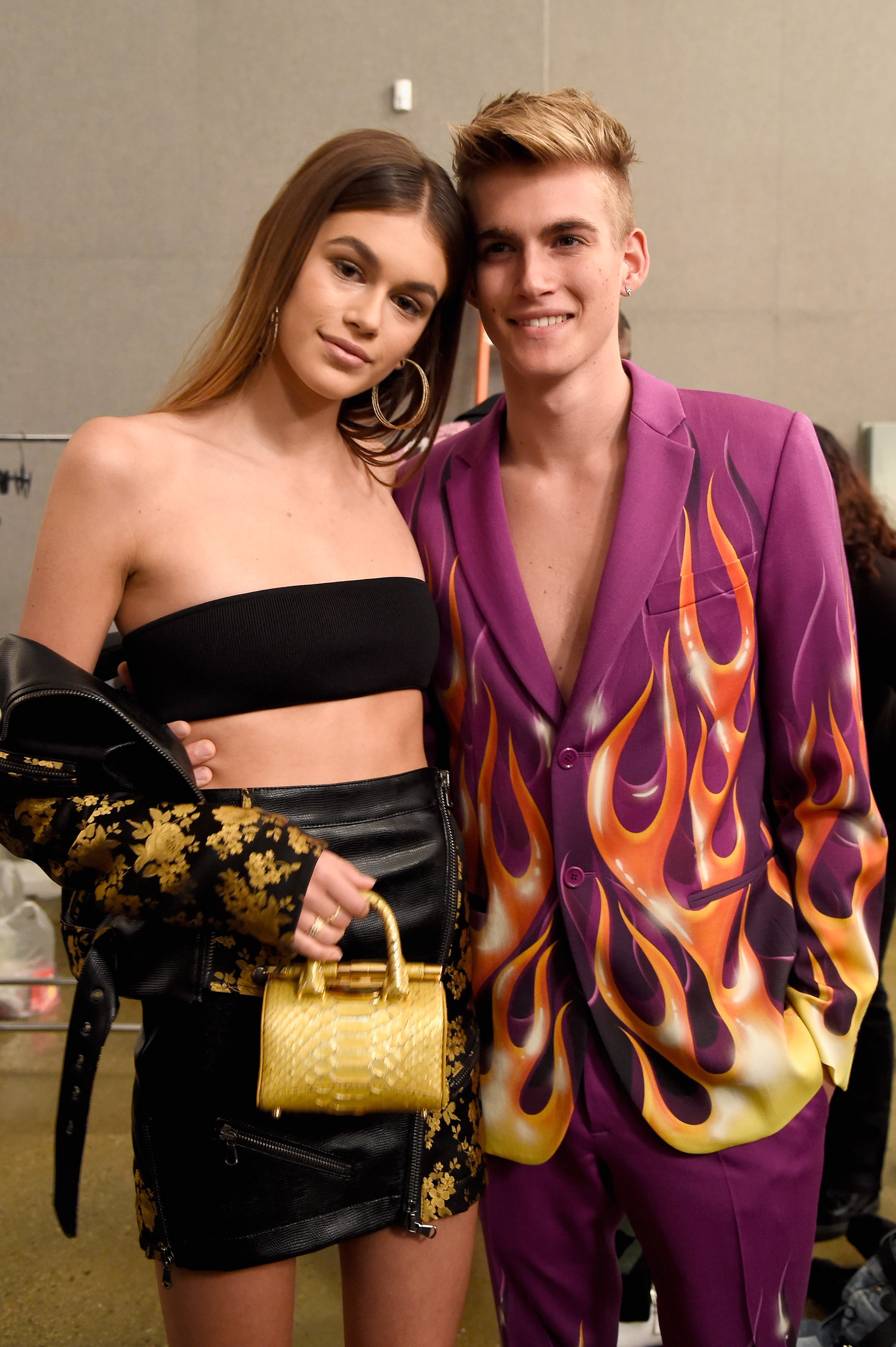 Models Kaia Gerber and Presley Gerber pose backstage at Moschino Spring/Summer Menswear and Women's Resort Collection at Milk Studios on June 8, 2017 in Hollywood, California. | Source: Getty Images
