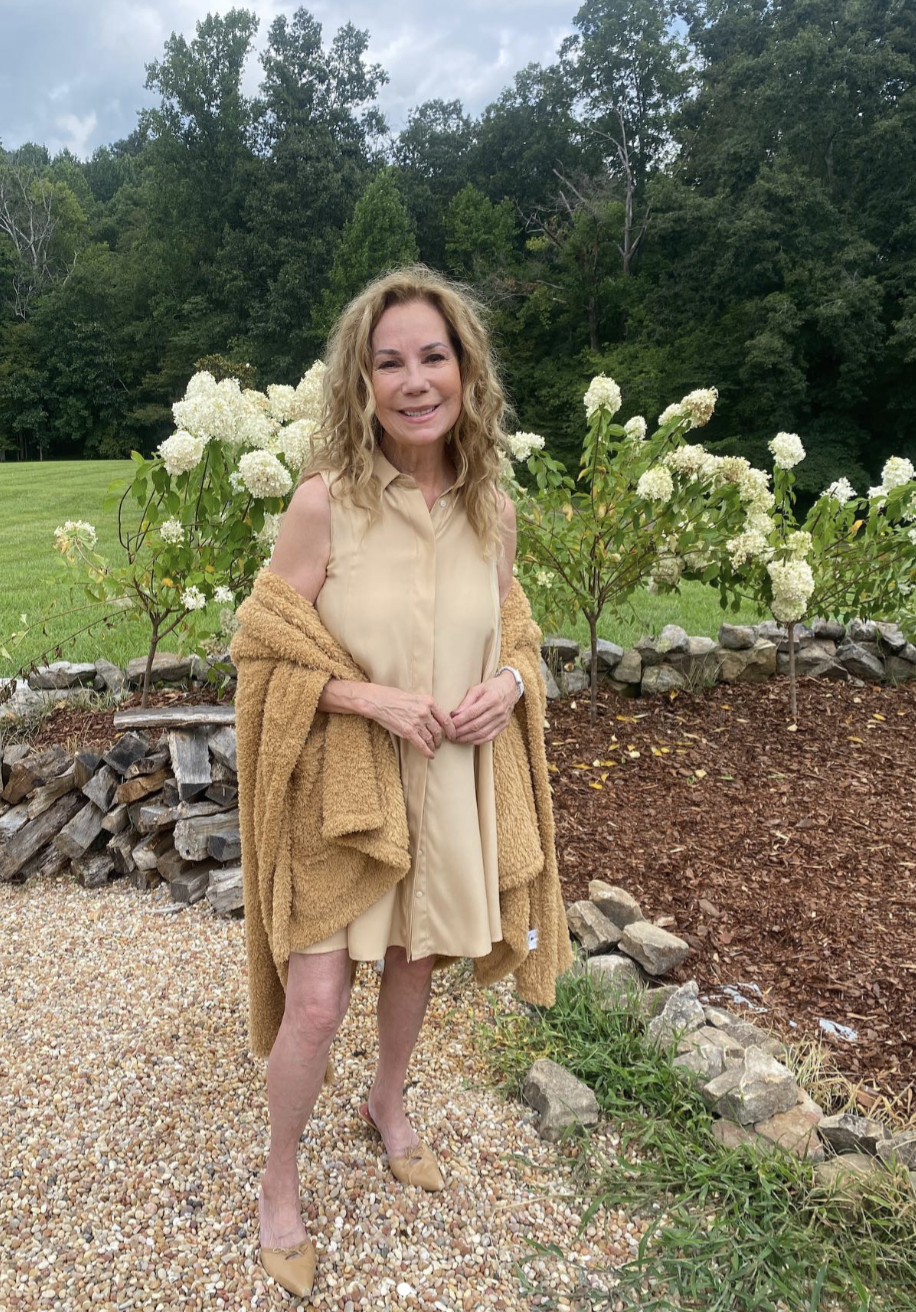 Kathie Lee Gifford poses in her Nashville garden, surrounded by blooming white hydrangeas and lush greenery — a glimpse of the quieter life she has embraced in Tennessee. | Source: Instagram @kathielgifford.