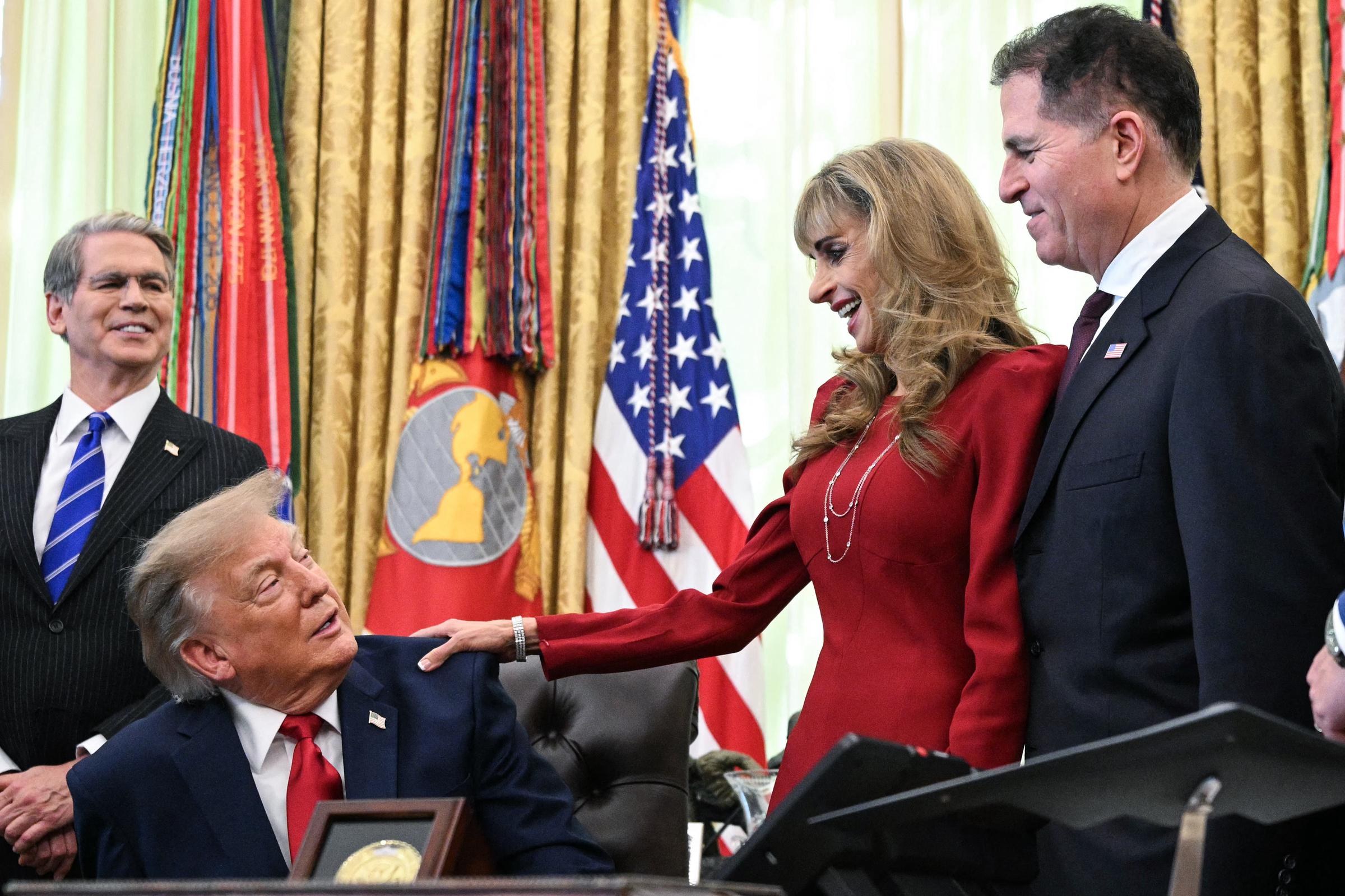 Susan Dell joins President Donald Trump, Treasury Secretary Scott Bessent and Michael Dell during remarks about “Trump Accounts” in the Oval Office of the White House in Washington, D.C. Susan appeared beside her husband as Trump discussed the investment savings accounts for children.