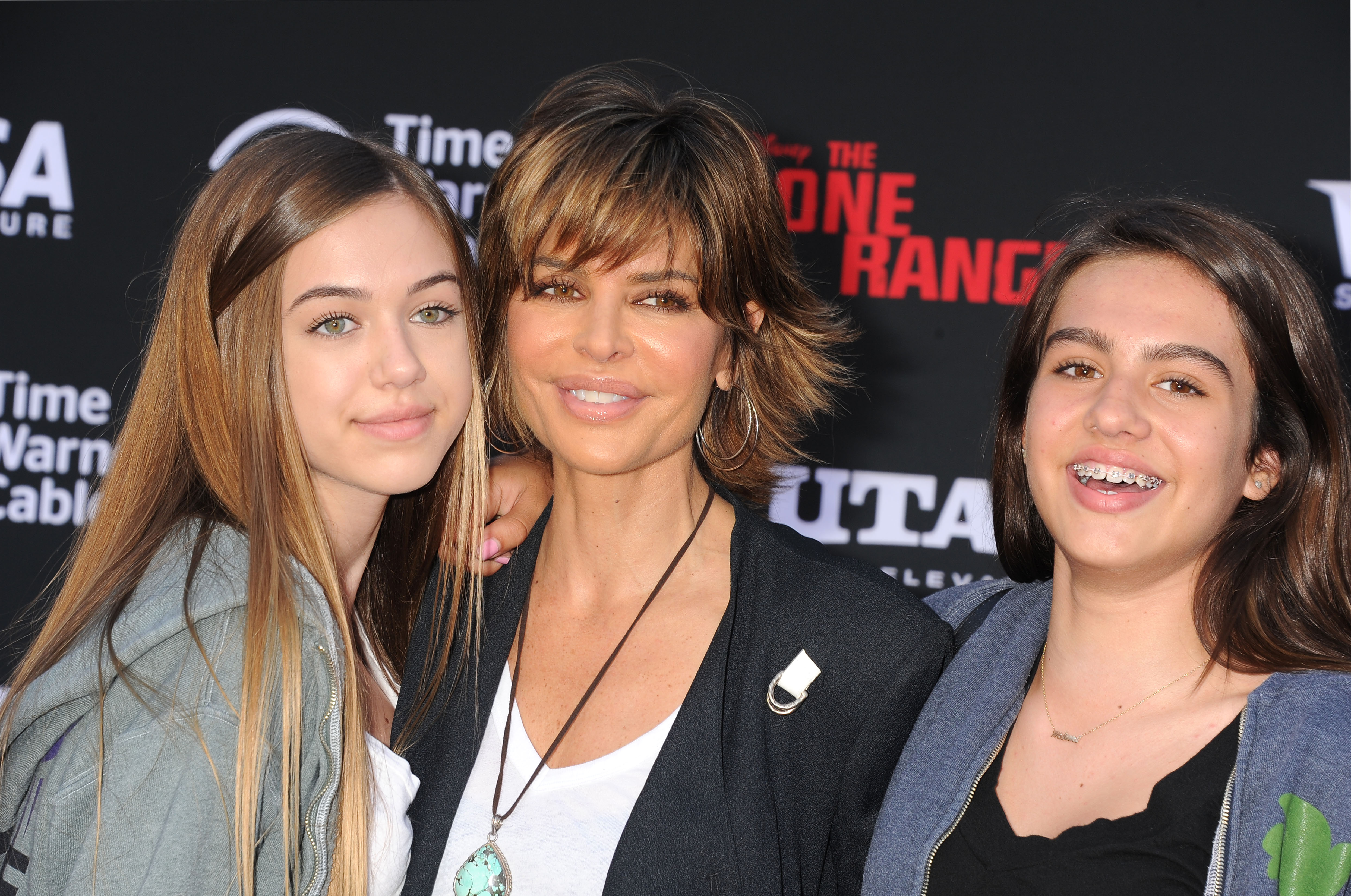 The reality star, daughters Delilah Hamlin and Amelia Hamlin arrive at "The Lone Ranger" world premiere at Disney's California Adventure on June 22, 2013, in Anaheim, California | Source: Getty Images