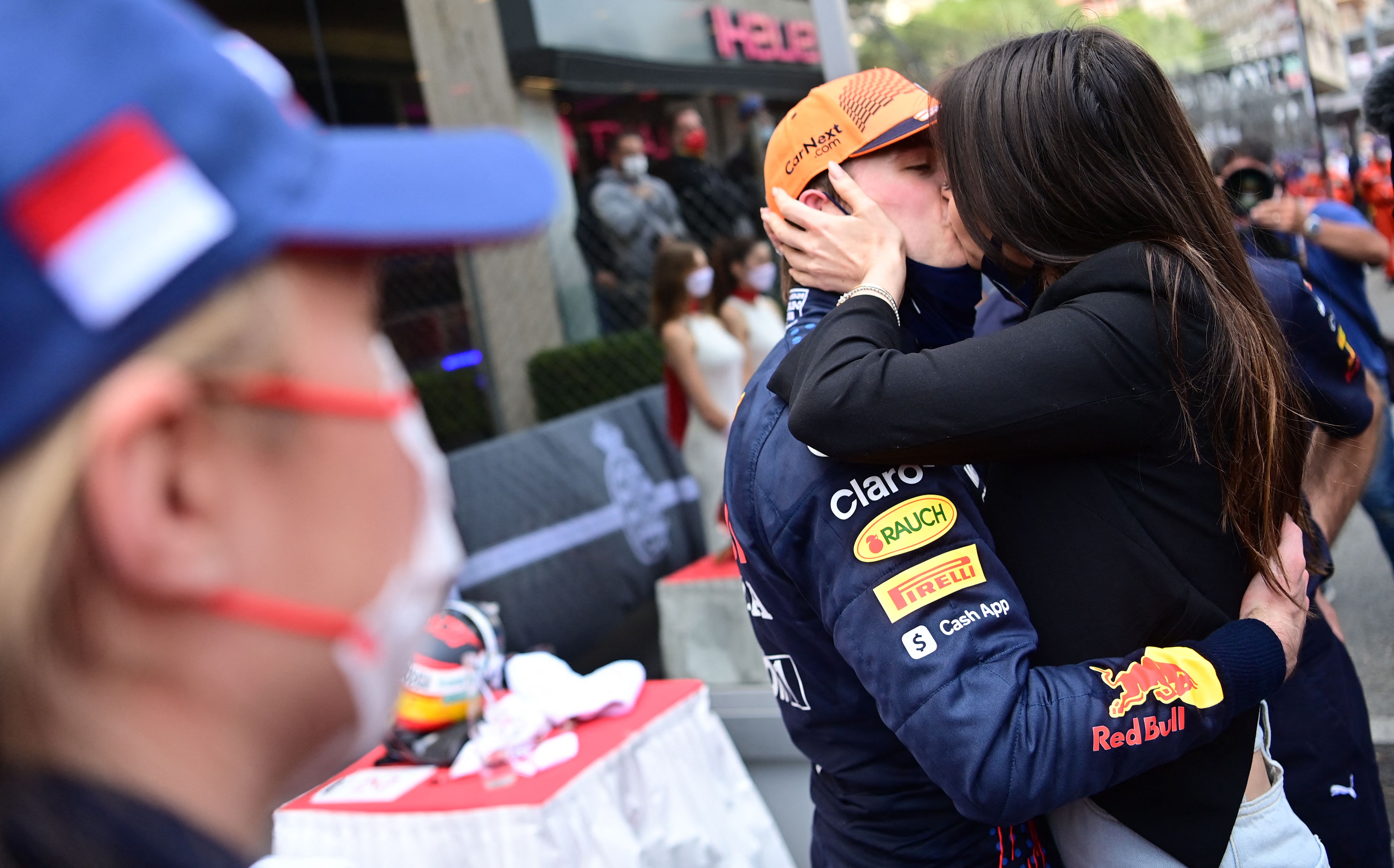 Winner Red Bull's Dutch driver Max Verstappen and his girlfriend Kelly Piquet are captured sharing a celebratory kiss after the Monaco Formula One Grand Prix at the Monaco street circuit in Monaco, on May 23, 2021, a gesture that has since become a regular post-race ritual for the couple.