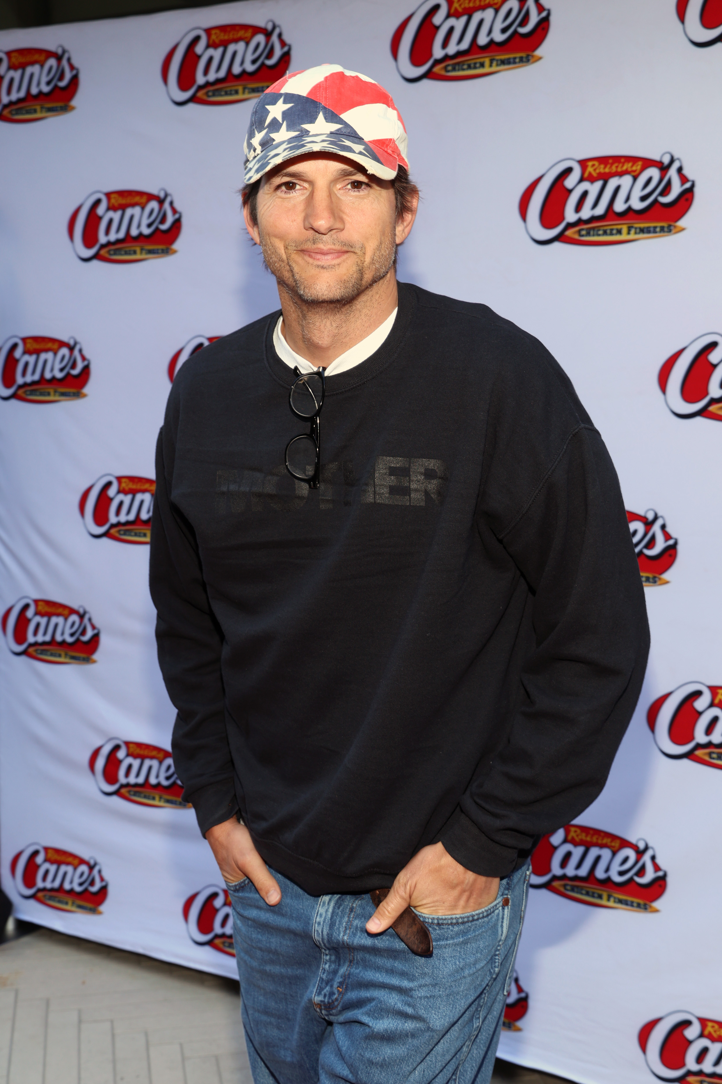 Ashton Kutcher attends a celebrity party hosted by Todd Graves, owner and founder of Raising Cane's, at Lumiere Brasserie Restaurant in Century City, California, on June 25, 2026. | Source: Getty Images