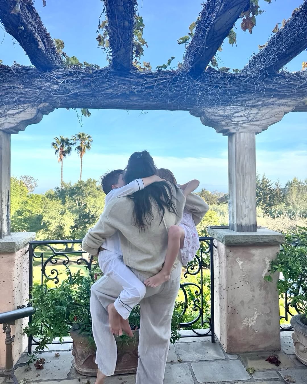 Prince Archie, Meghan, Duchess of Sussex, and Princess Lilibet from a post dated May 11, 2025. | Source: Instagram/meghan
