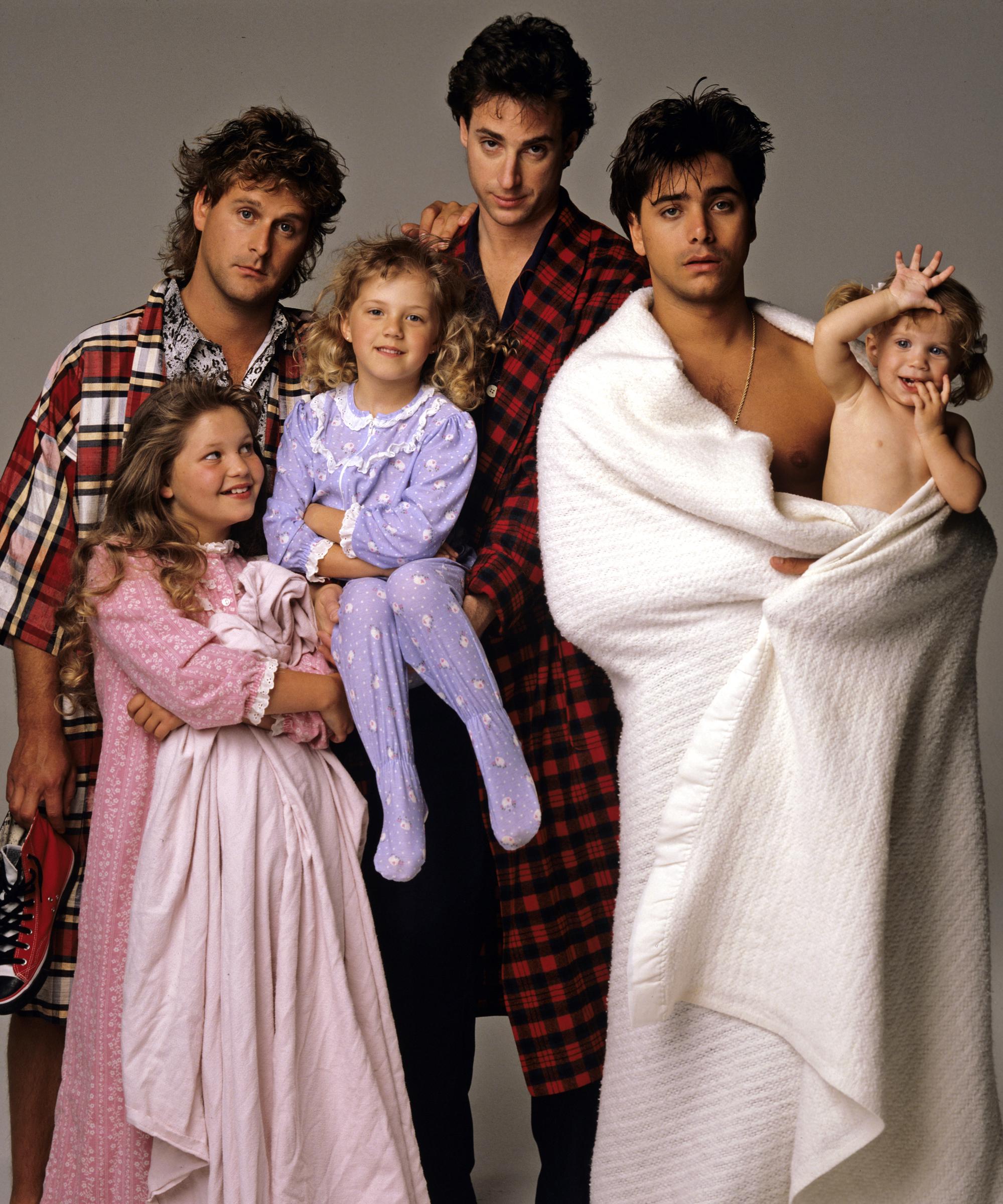 This promotional image captures the original Tanner family before several new characters joined the household in later seasons. While every cast member has changed over the years, two familiar faces have spent decades avoiding the spotlight, making even the simplest public appearance a major talking point. | Source: Getty Images
