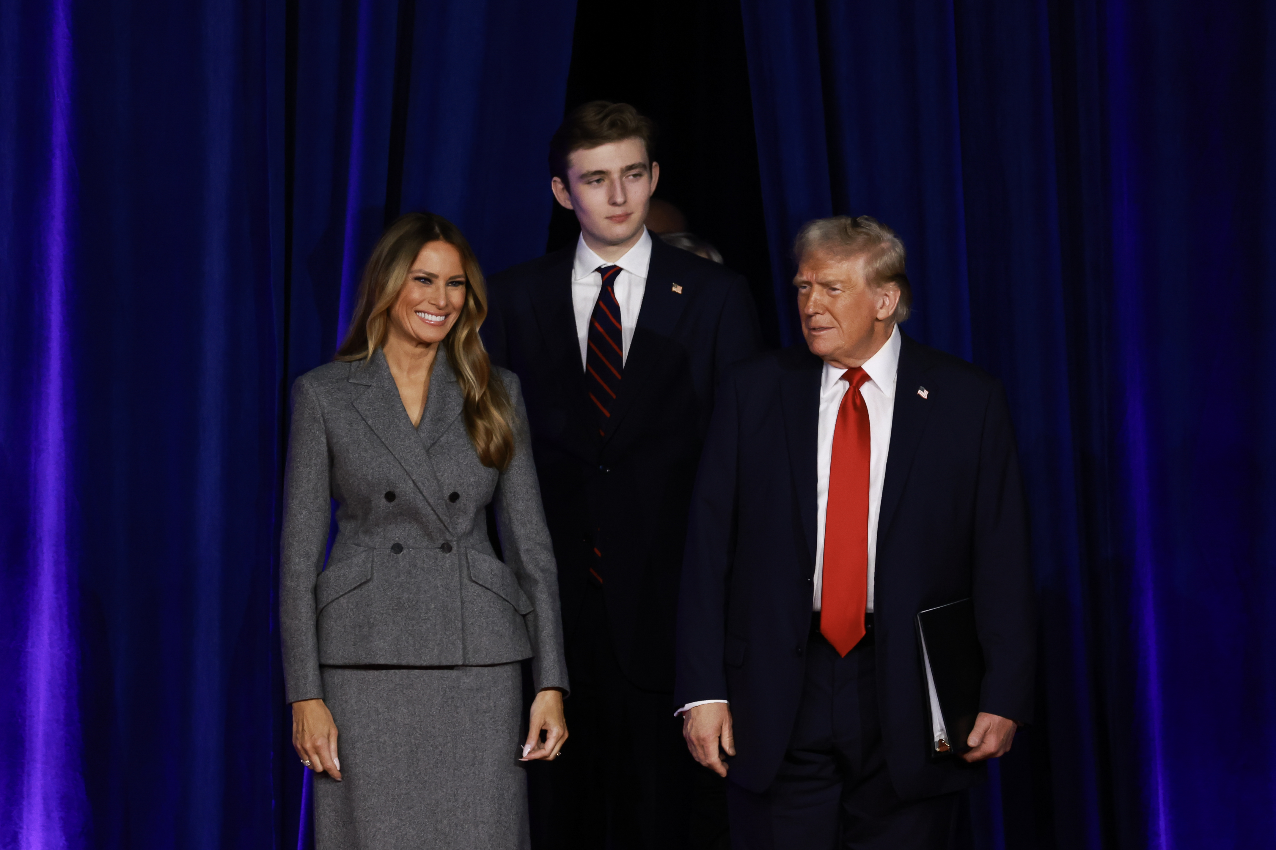 US First Lady Melania Trump and US President Donald Trump with their son, Barron Trump, at an election night event at the Palm Beach Convention Center in West Palm Beach, Florida on  November 6, 2024. | Source: Getty Images