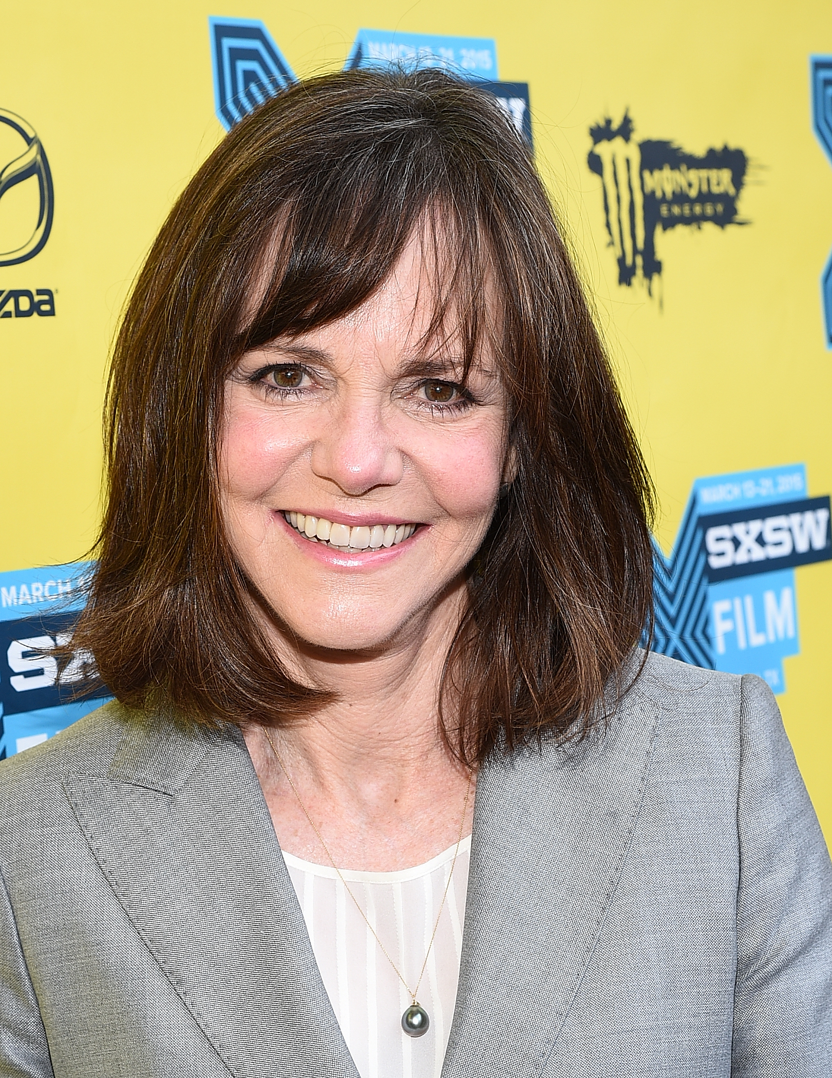 Sally Field, embracing herself as she is with strands of white in her hair, arrives at the premiere of "Hello, My Name Is Doris" during the SXSW Music, Film + Interactive Festival at the Paramount Theatre in Austin, Texas.