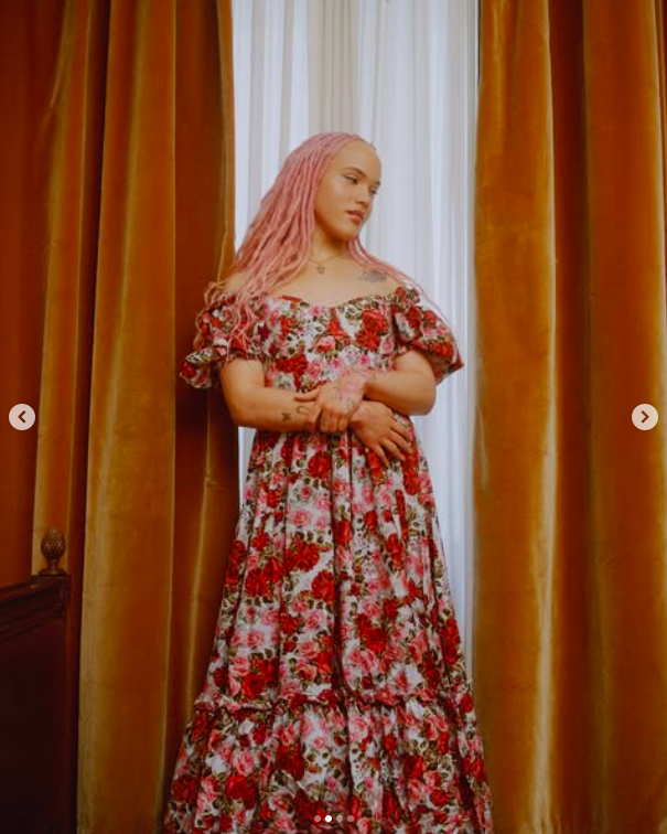 Airyn De Niro posing in an off-the-shoulder floral dress, posted on April 29, 2025. | Source: Instagram/aleckvenegas