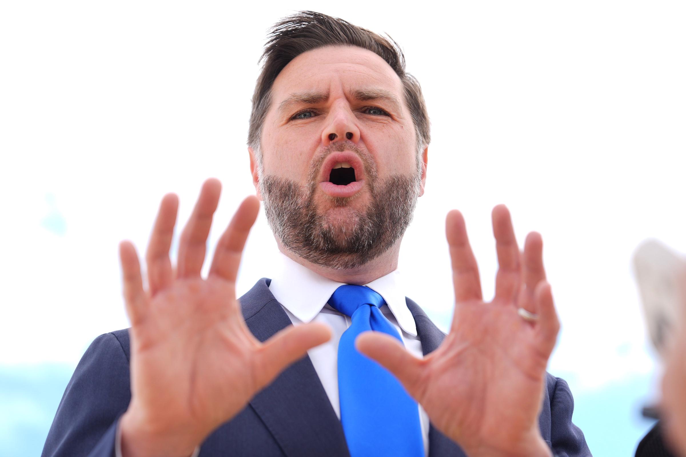 JD Vance speaks to reporters at Joint Base Andrews before a September 2026 trip to Missouri and Kansas. Weeks later, his presence during Usha's tense helicopter exit became a point of discussion among some viewers online. | Source: Getty Images