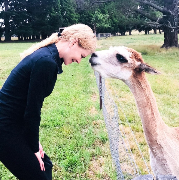 One of the farm's resident alpacas greets Nicole Kidman at the fence line, highlighting the playful personality and close connection between the animals and the land they roam. From a post dated December 25, 2020. | Source: Instagram/nicolekidman