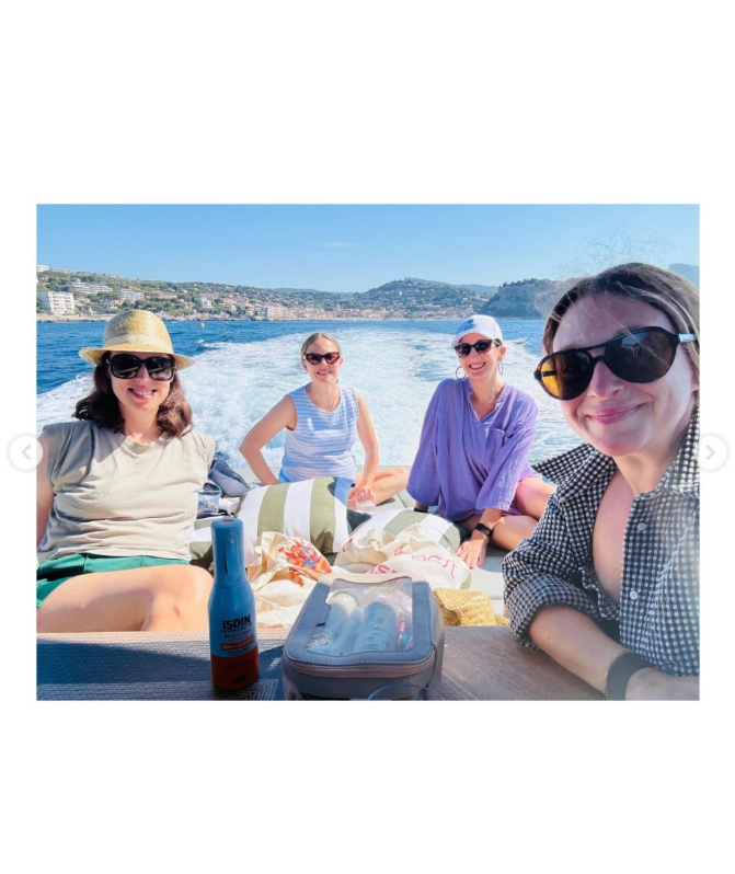 Portman enjoyed a sunny boat ride with friends, posing for a group photo against a scenic coastal backdrop. The relaxed gathering was another memory she chose to include alongside her pregnancy update. | Source: Instagram/natalieportman