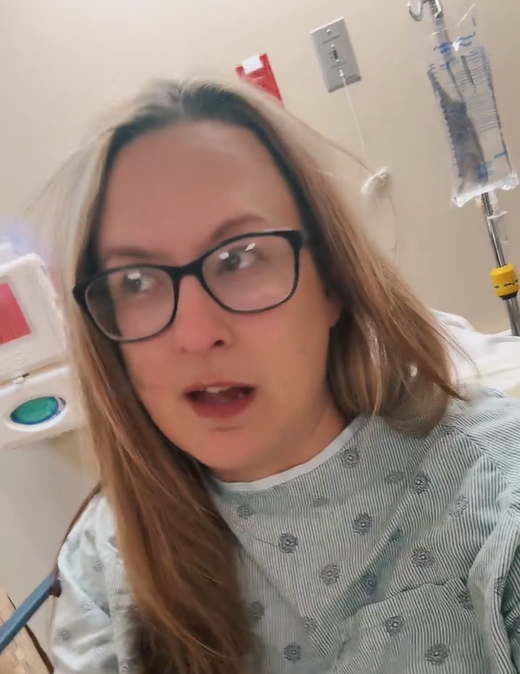 Rachel Tussey in an hospital bed, as seen from her final video dated February 25, 2026. | Source: TikTok/midlifeunmuted