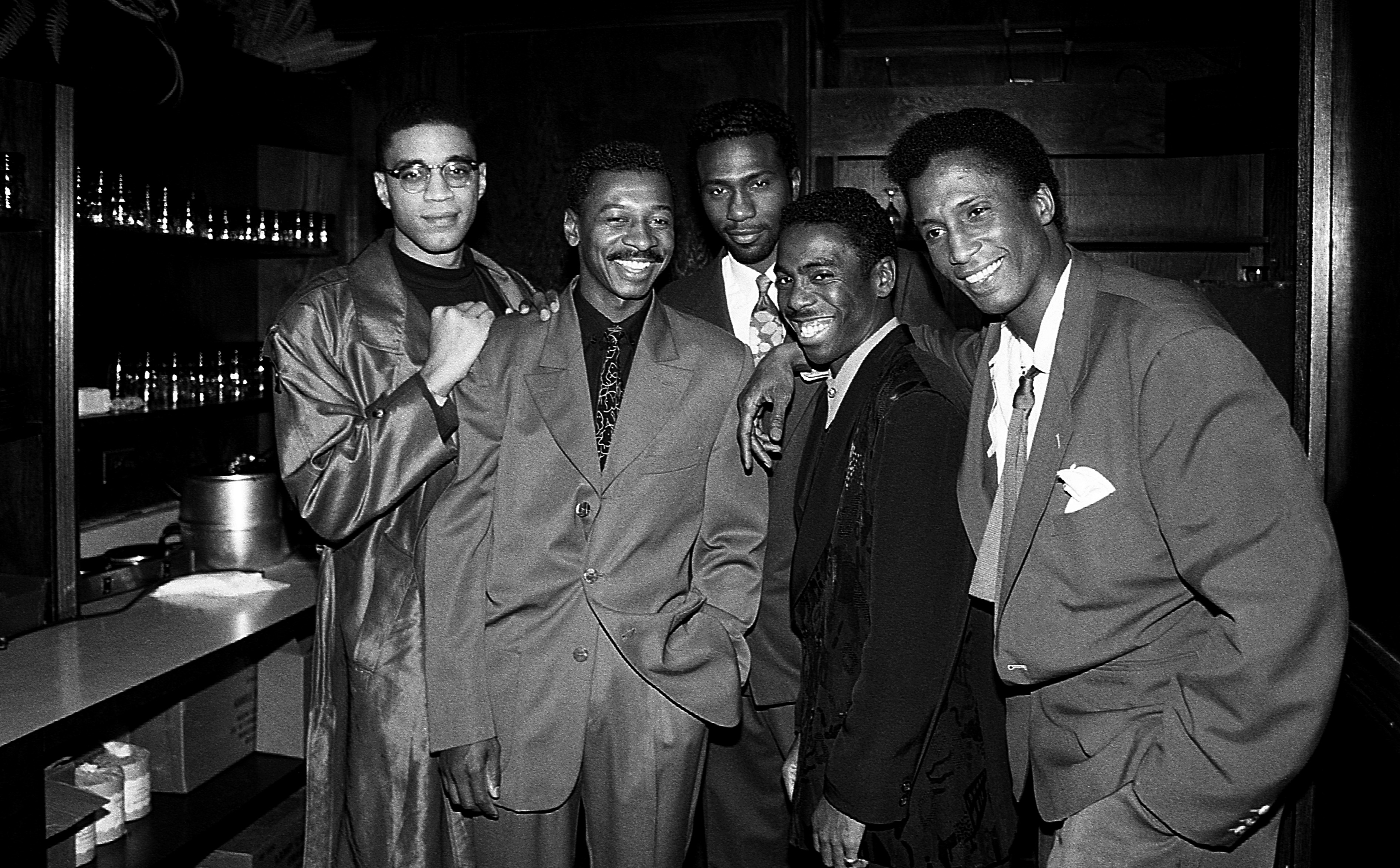 Leon Robinson posing with Harry J. Lennix, Robert Townsend, Tico Wells and Michael Wright from "The Five Heartbeats" at Orly's Restaurant in Chicago, Illinois in February 1991. | Source: Getty Images