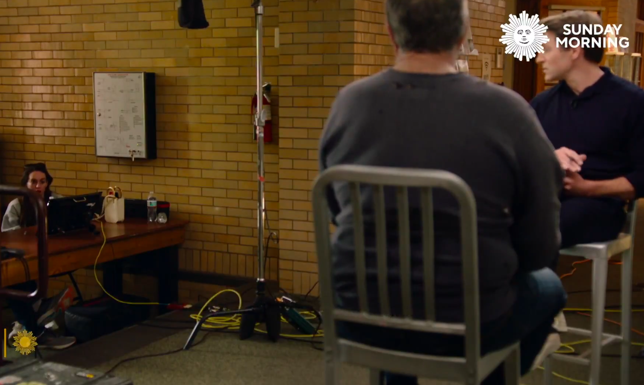 Jordon Hudson seen off-camera during Bill Belichick's interview with CBS Sunday Mornings, posted on April 27, 2025. | Source: X/@NFL_DovKleiman