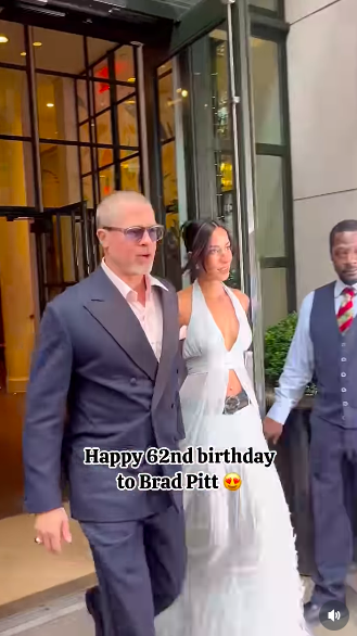Brad Pitt and Ines de Ramon walking out of a building hand-in-hand as they make their way to their car, posted on December 19, 2025. | Source: Instagram/girlfromjerseycity