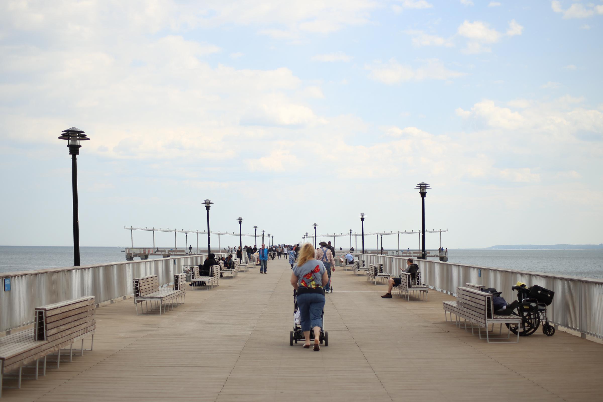 Woman walking with stroller in Brooklyn. | Source: Getty Images