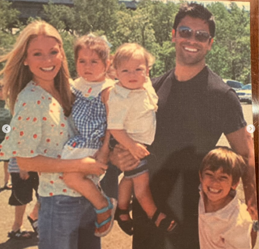 Kelly Ripa and Mark Consuelos pose with their children, including a young Lola Consuelos, in a family photo. | Source: Instagram/kellyripa