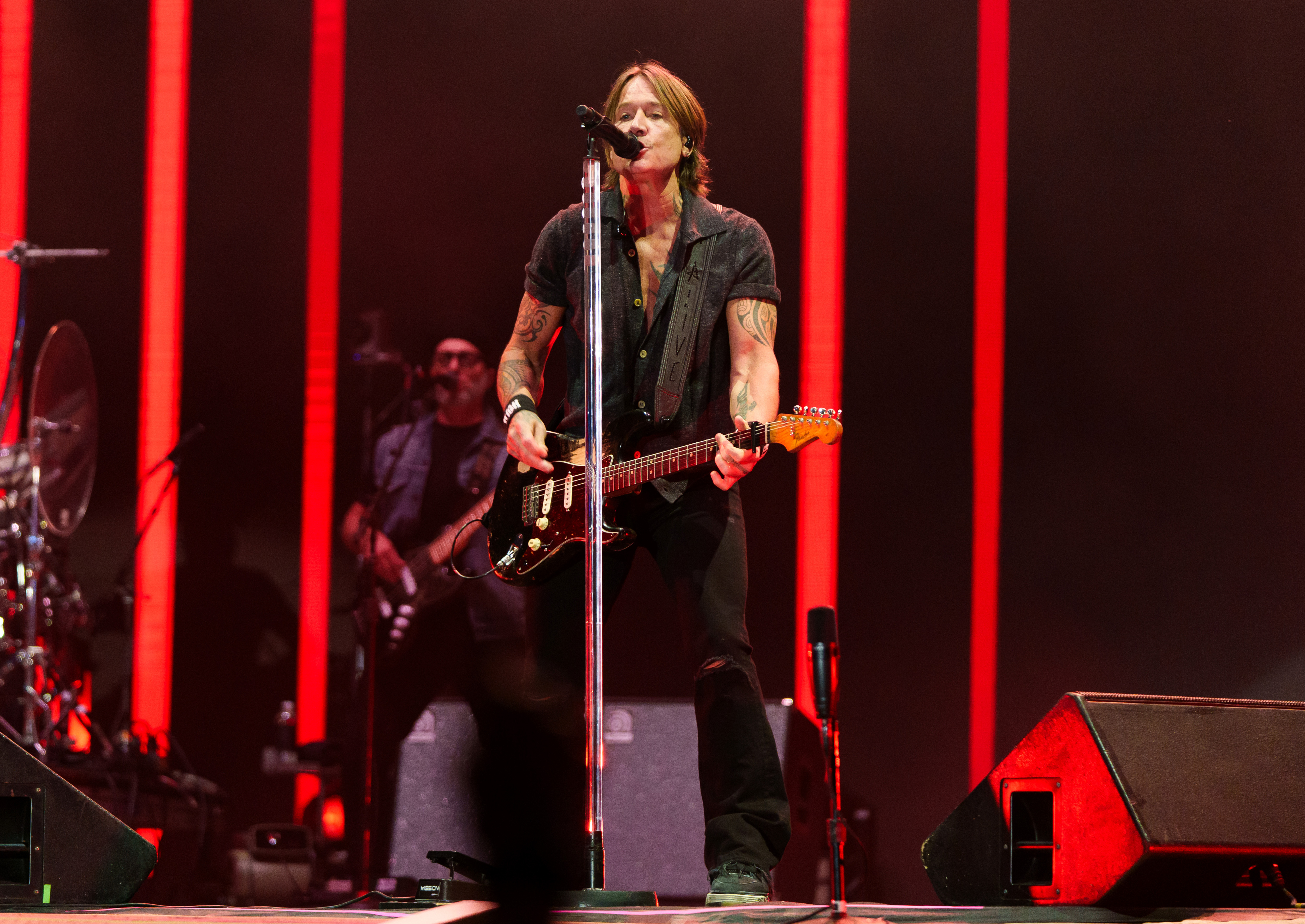 Keith Urban performs onstage in July 2026. The singer later described “We Go Back” as a story about former lovers whose paths cross again years later, only for the woman to reveal that she has moved on with someone else. | Source: Getty Images