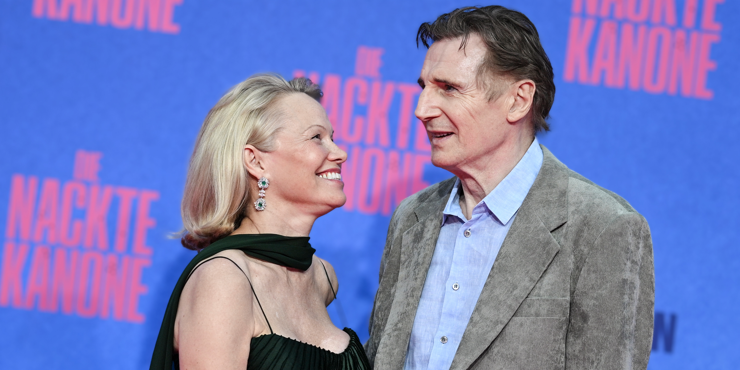 Pamela Anderson and Liam Neeson | Source: Getty Images