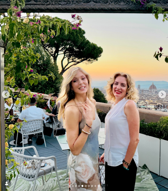 The former model, who was once married to Donald Trump, with a friend posing in a restaurant with an awesome view in a carrousel posted on August 4, 2026. | Source: Instagram/marlamaples