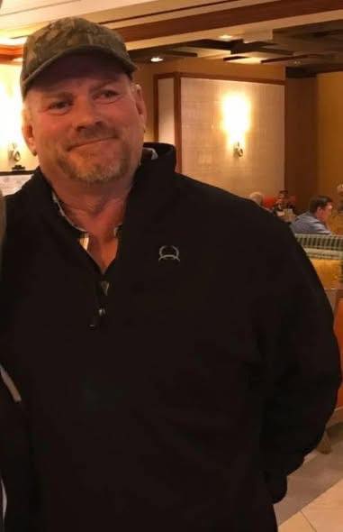 David McCarty smiling for a picture, posted in January 2026. | Source: Facebook