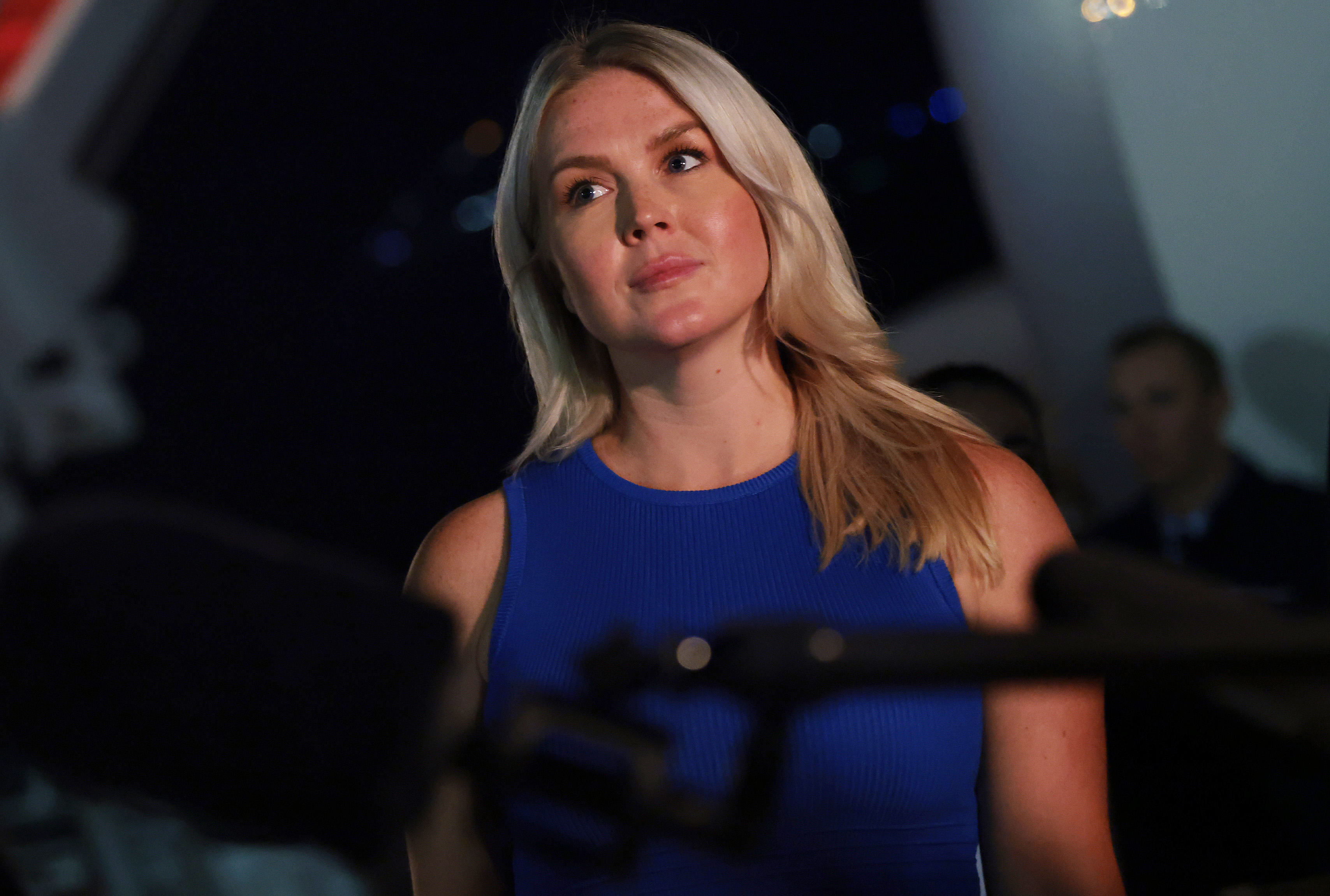 Karoline Leavitt said she made the "bittersweet" decision to leave the White House. Donald Trump has already asked her to remain in his orbit. | Source: Getty Images