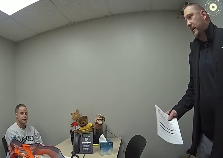 Bodycam footage showing an officer explaining the DNA collection process to Caleb Flynn, dated March 2, 2026 | Source: YouTube/Law&Crime Network