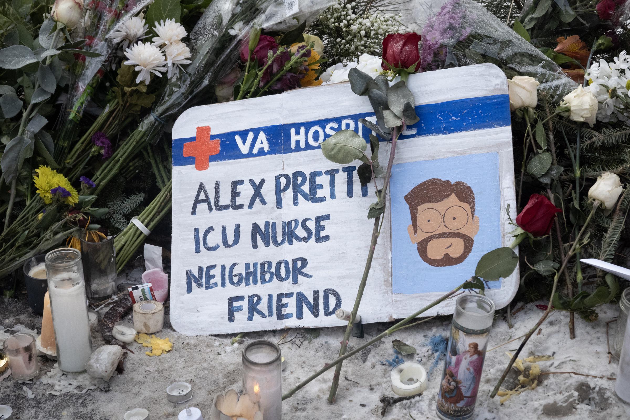 Flowers and candles make up a memorial to Alex Pretti on January 25, 2026, in Minneapolis, Minnesota | Source: Getty Images