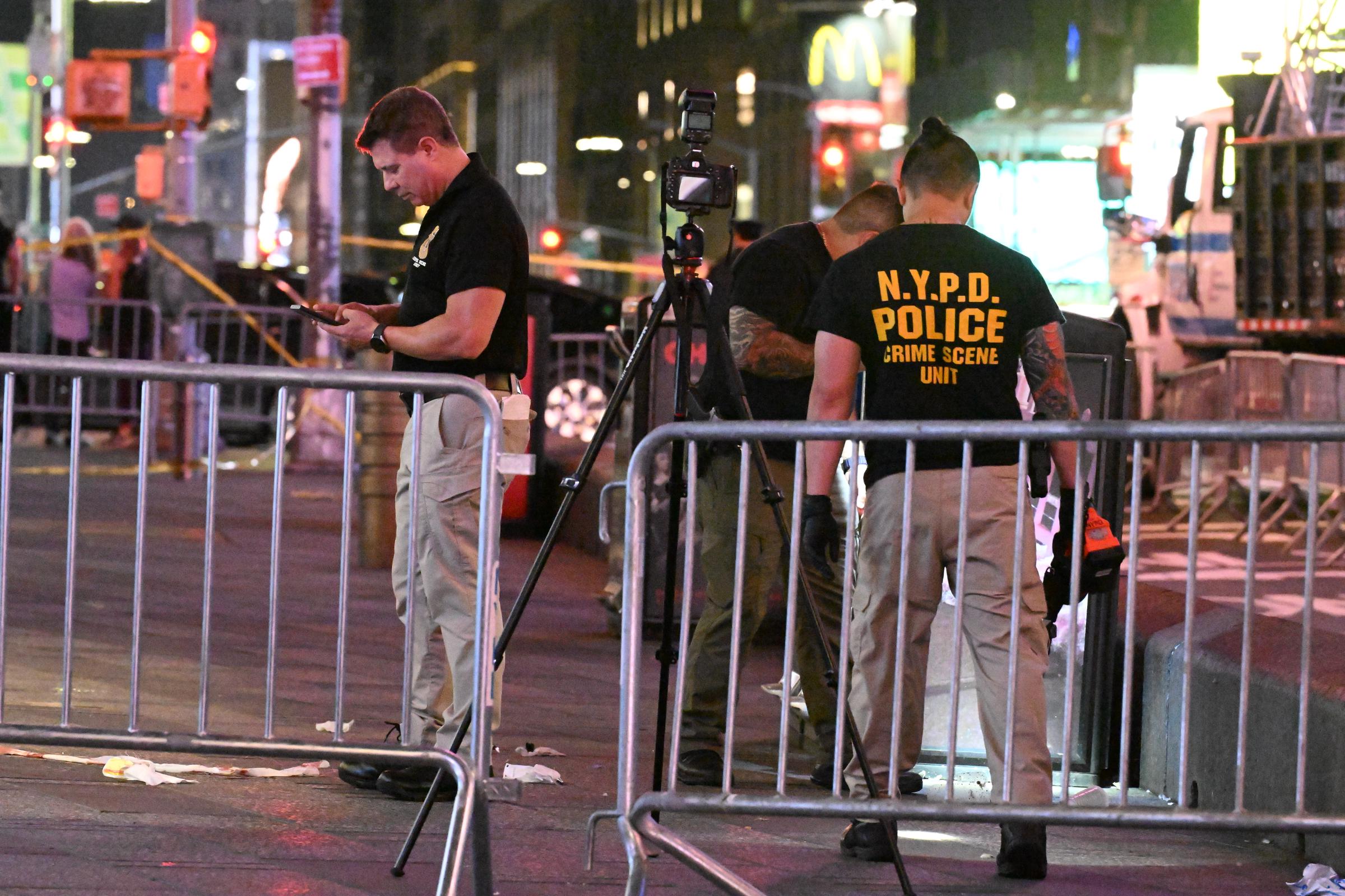 NYPD crime scene investigators remained at the scene after Pamela Cisneros was shot by police and Piacenti was fatally stabbed. Cisneros was taken to Bellevue Hospital, where she later died from her wounds. | Source: Getty Images