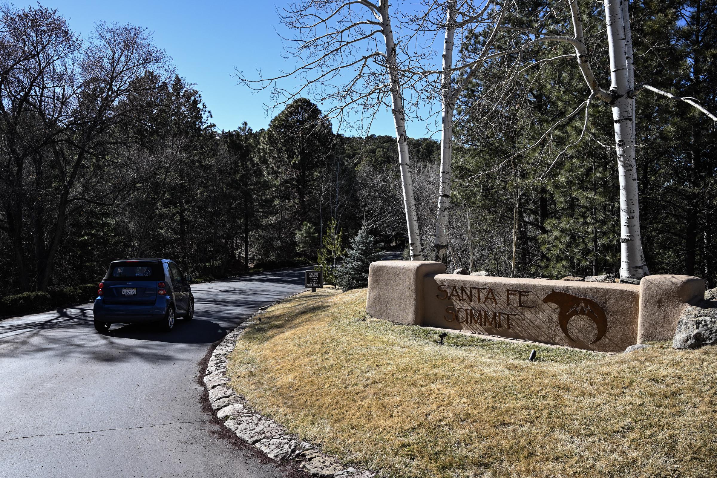 A view of the entrance to the Santa Fe Summit neighborhood where Gene Hackman lived on February 28, 2025 | Source: Getty Images