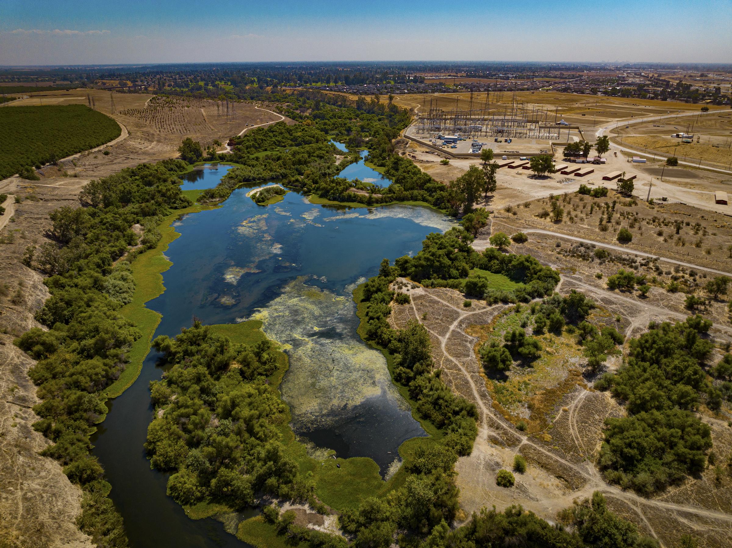The San Joaquin River in Fresno, California, near the area where the plane crash occurred on September 5, 2026. | Source: Getty Images