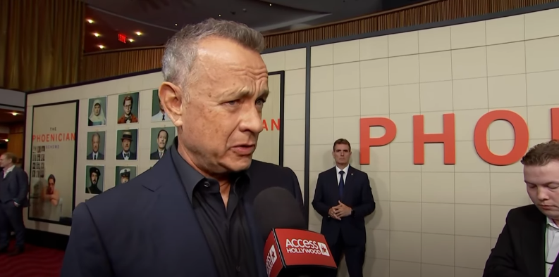 Tom Hanks at the premiere of "The Phoenician Scheme" while being interviewed about E.A. Hanks' book, dated May 29, 2025 | Source: Youtube/Access Hollywood