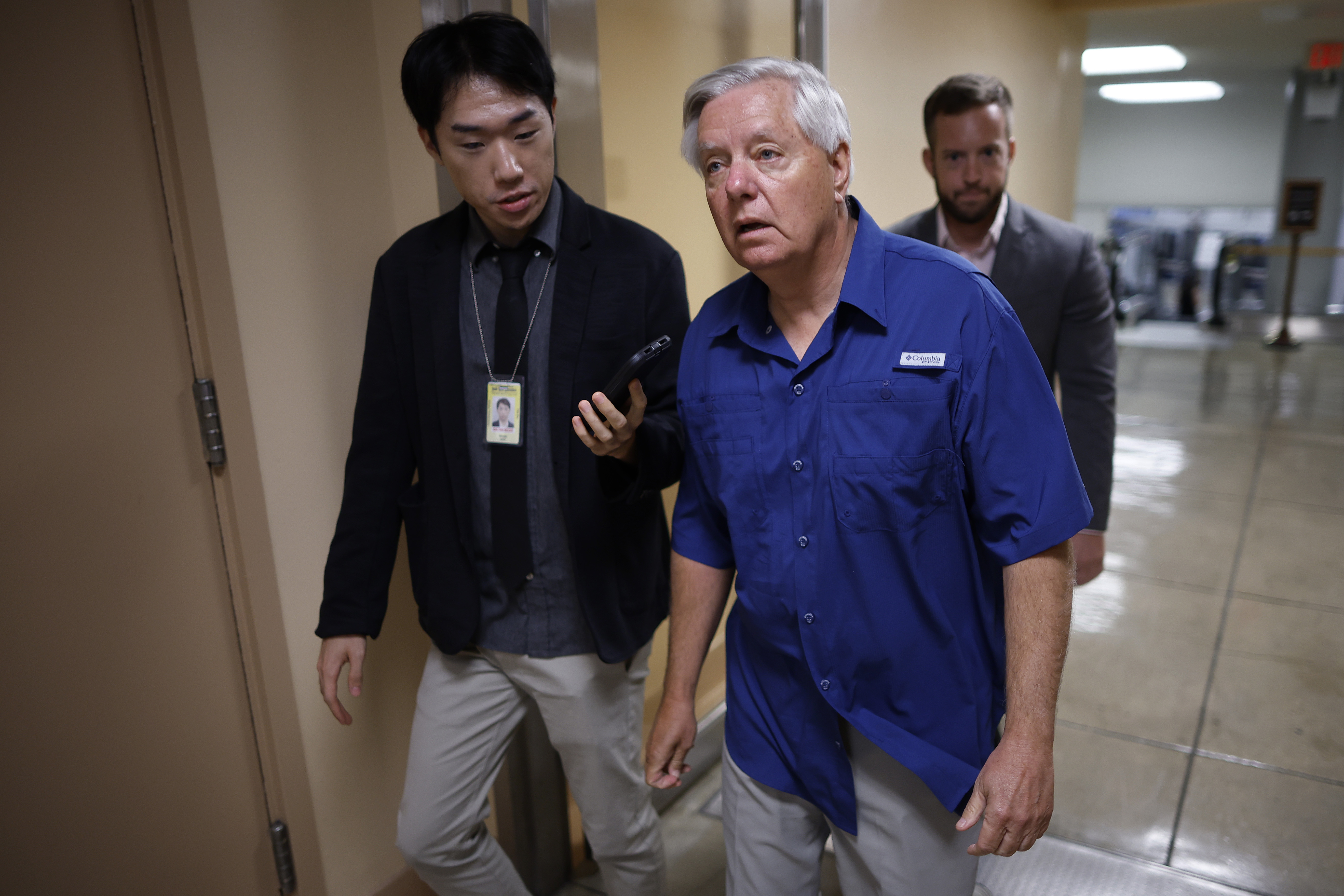 Lindsey Graham makes his way through the Capitol as lawmakers prepare for another week of votes, drawing attention from reporters while navigating a busy day on Capitol Hill. | Source: Getty Images