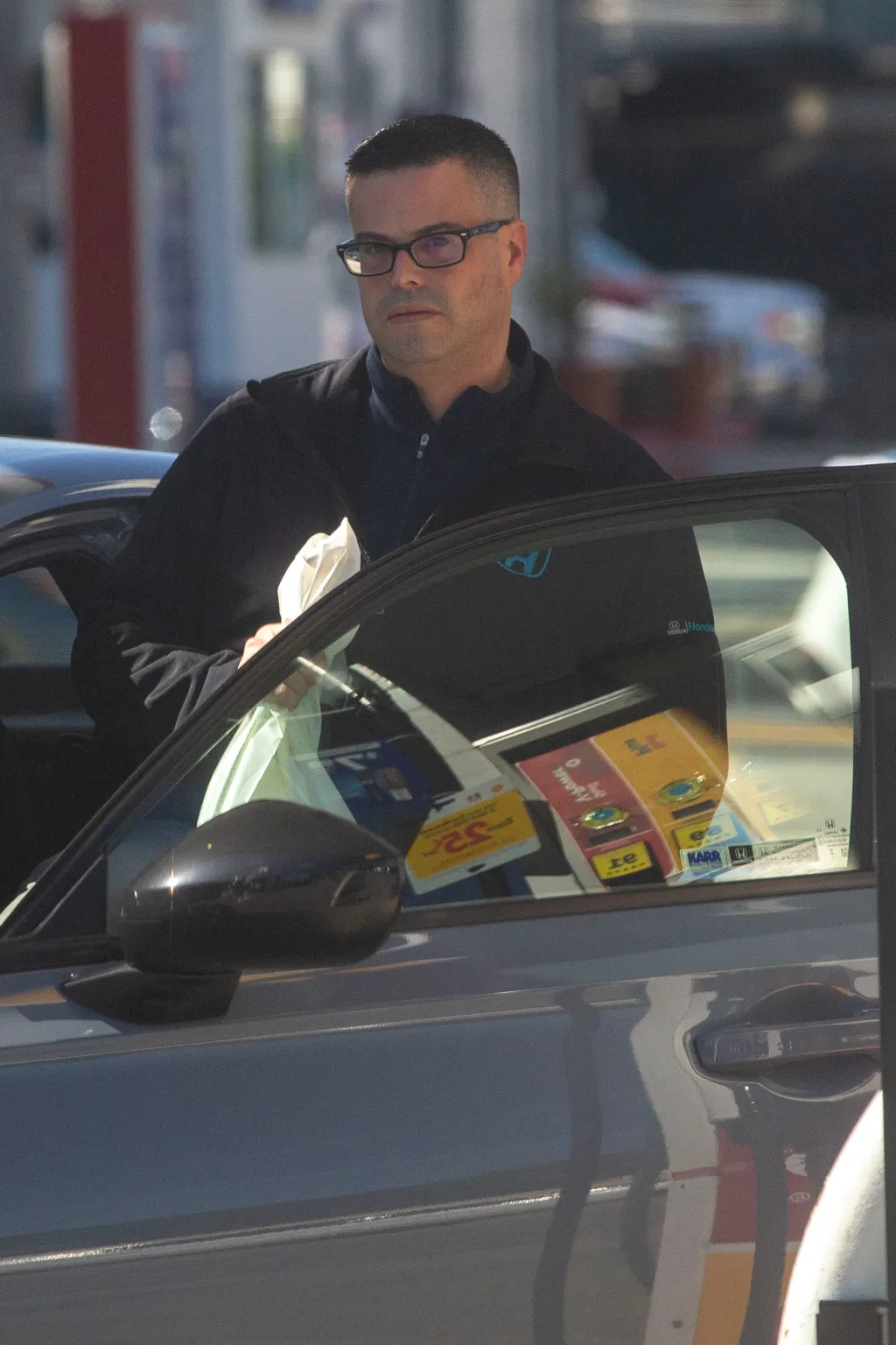 The former child star was photographed beside a car in Los Angeles in April 2024, wearing glasses and a dark Honda jacket — a rare glimpse of his life decades after leaving Hollywood.