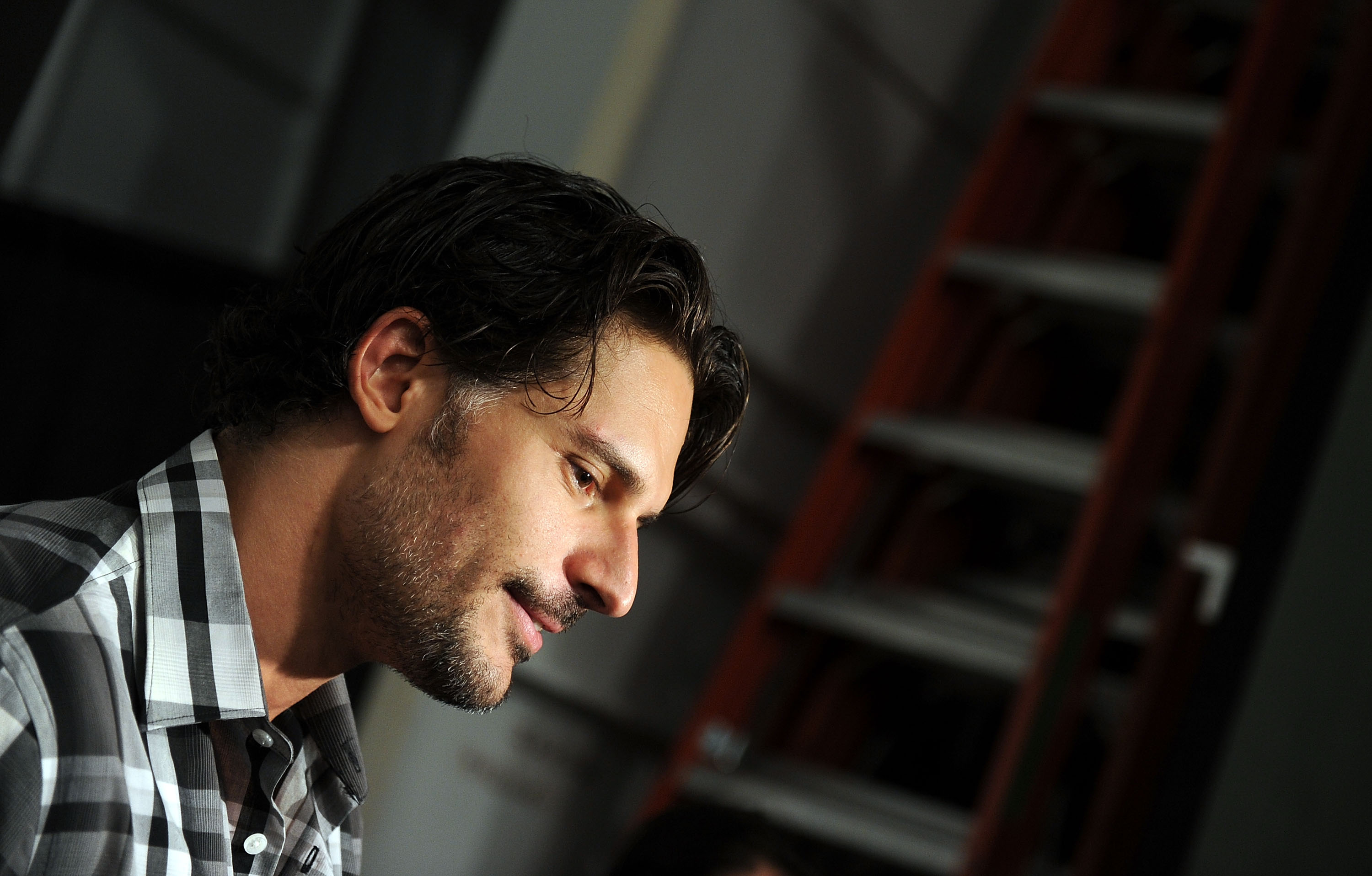 Joe Manganiello poses backstage at the Perry Ellis Spring 2012 fashion show in New York City on September 12, 2011. The appearance came during his run as Alcide Herveaux on HBO's "True Blood," a role that brought wider attention to his physique. | Source: Getty Images