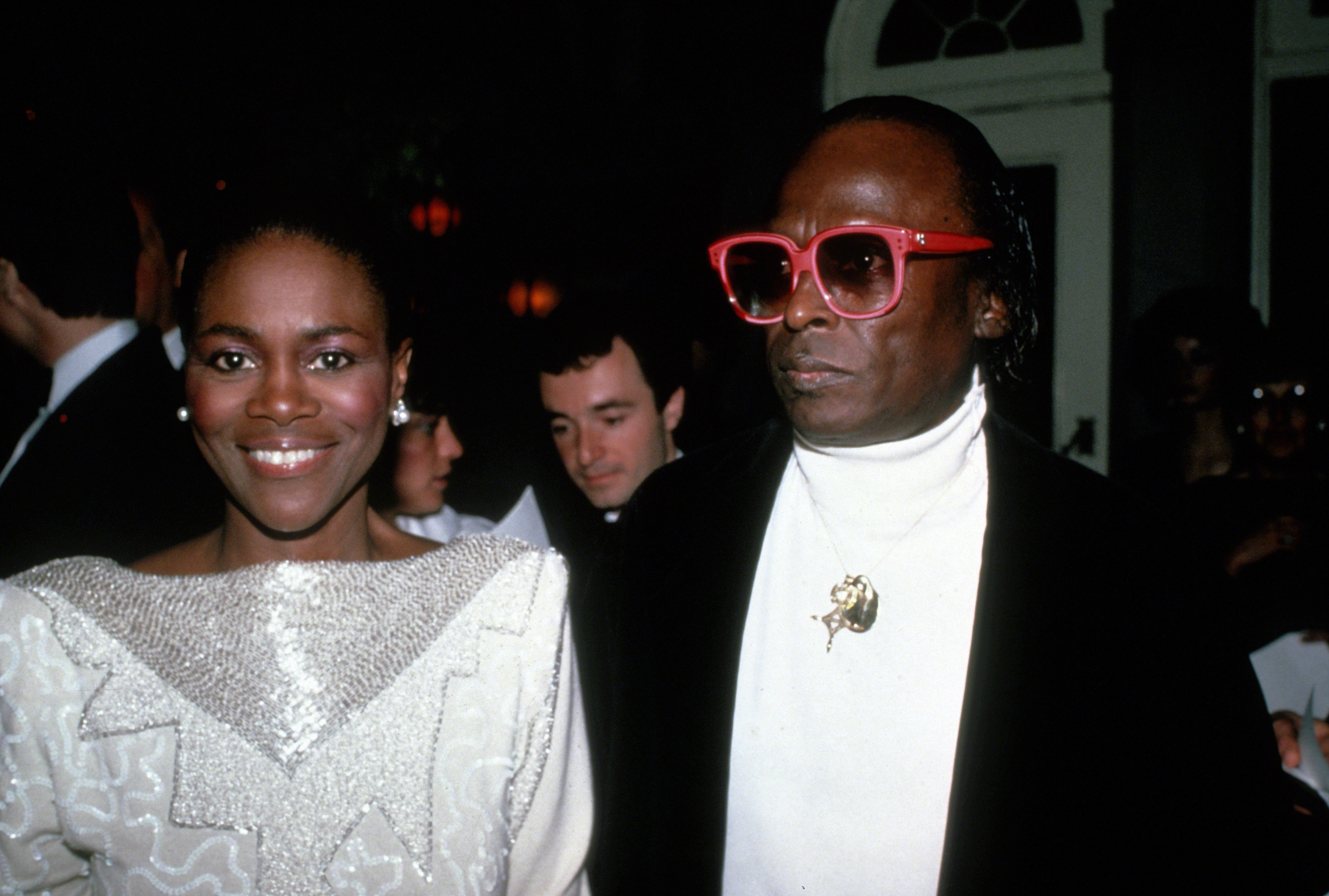 Cicely Tyson is pictured at an event in New York City alongside Miles Davis, smiling toward the camera in a candid moment | Source: Getty Images