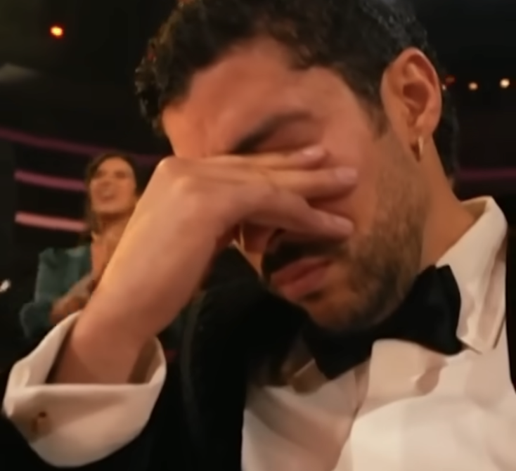 Bad Bunny reacts to winning Album of the Year for "DeBÍ TiRAR MáS FOToS" during the 68th Annual Grammy Awards at Crypto.com Arena on February 1, 2026, in Los Angeles | Source: YouTube/enews