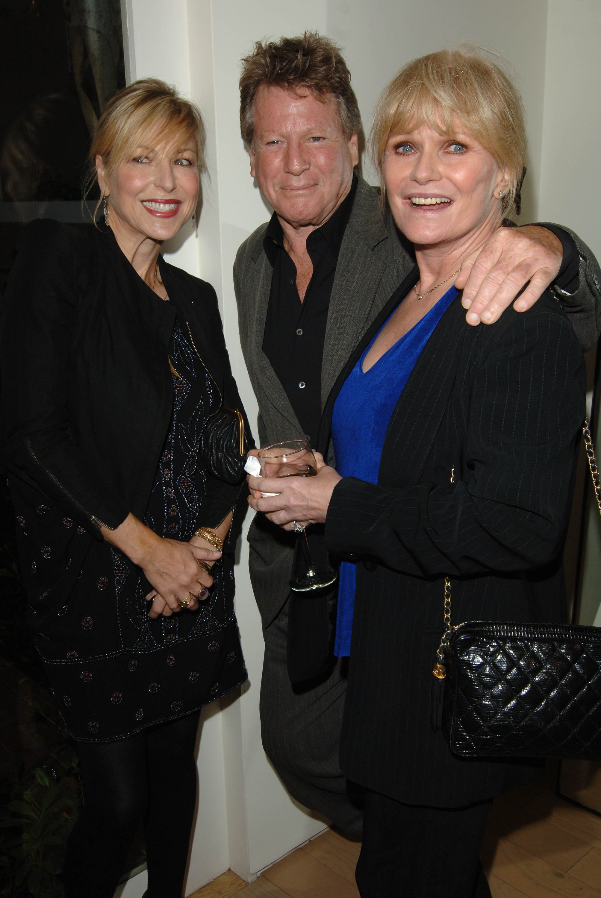 Tatum O'Neal, Ryan O'Neal and Valerie Perrine attend the Raquel Welch "Beyond The Cleavage" book party hosted by Alana Stewart at Oscar de la Renta Boutique on May 6, 2010, in West Hollywood, California.