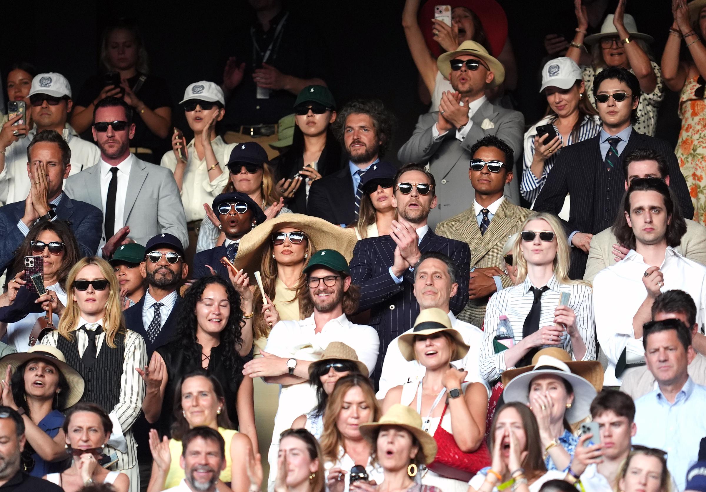 The celebrity-packed stands provided the wider context for why the accessory caused such a stir. In tightly arranged seating, even a fashionable statement can become a practical concern for spectators nearby. | Source: Getty Images