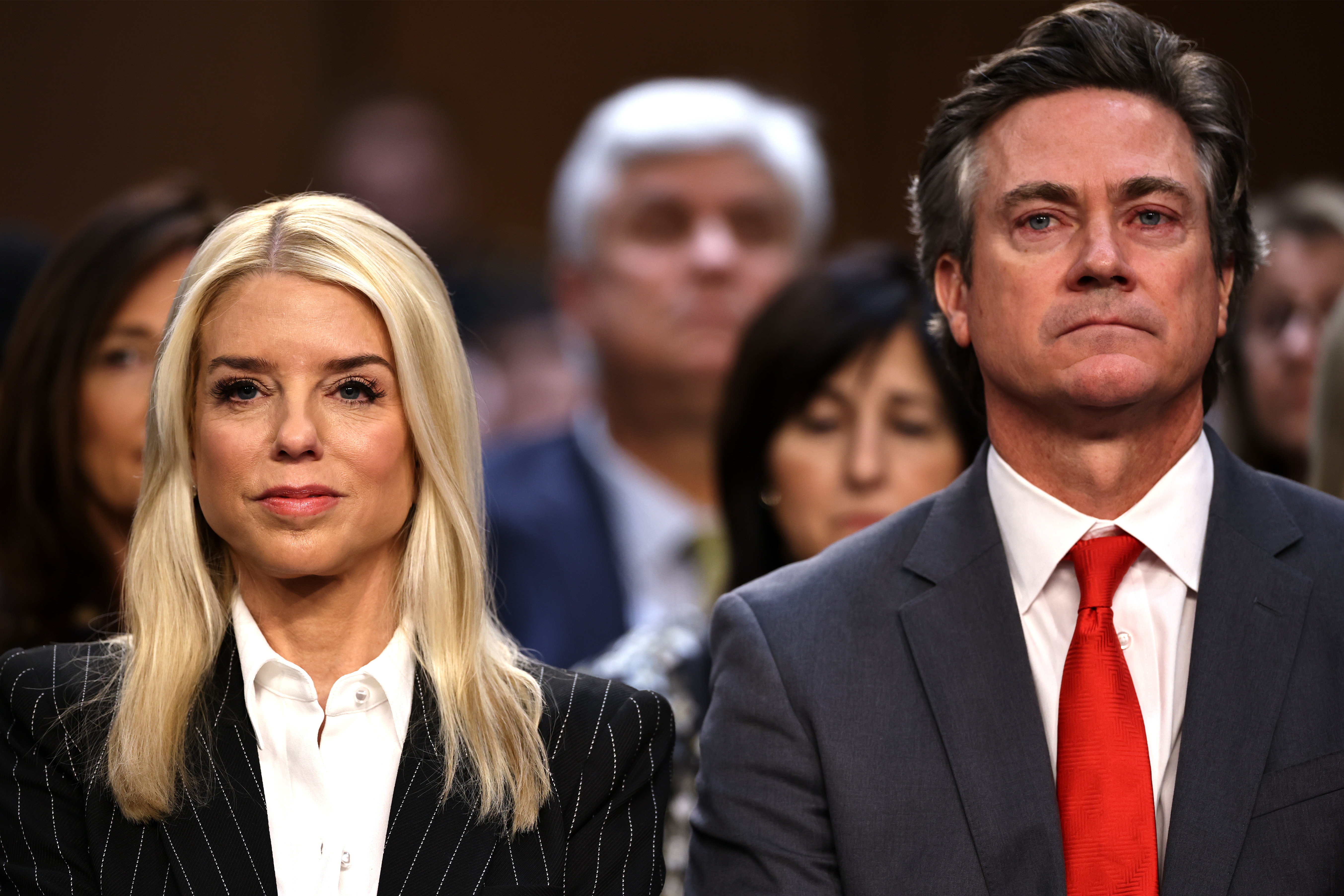 Pam Bondi attends her confirmation hearing to be U.S. Attorney General alongside John Wakefield in Washington, DC on January 15, 2025 | Source: Getty Images