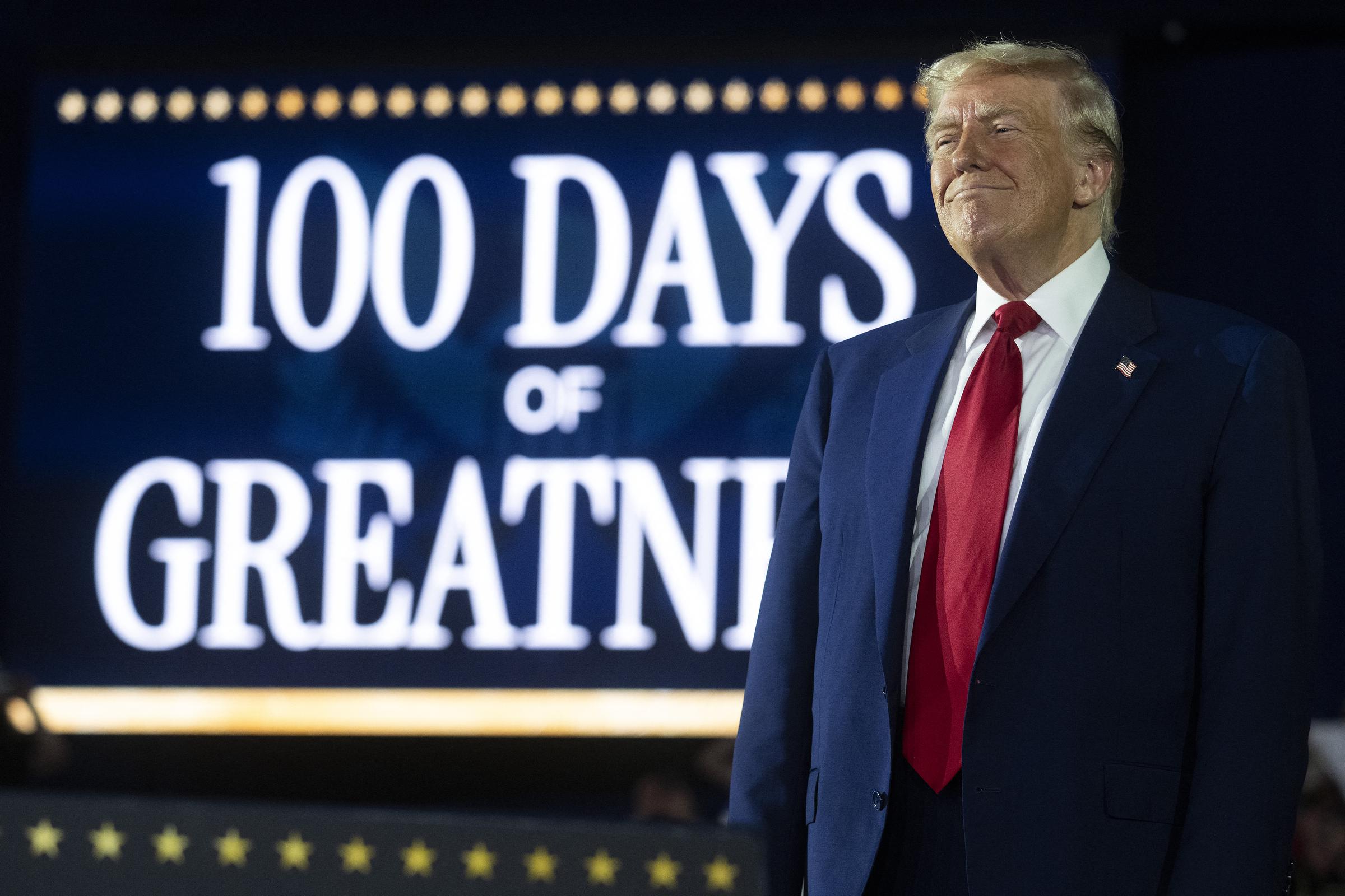Donald Trump about to give a speech marking his 100th day in office at Macomb County Community College Sports Expo Center in Warren, Michigan on April 29, 2025. | Source: Getty Images