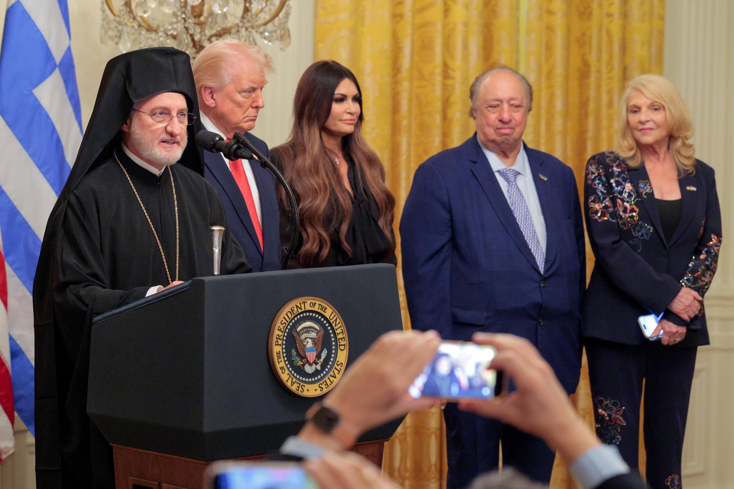 John and Margo Catsimatidis stood alongside Trump, Archbishop Elpidophoros and then-U.S. Ambassador to Greece Kimberly Guilfoyle during the White House ceremony honoring Greek Independence Day. | Source: Getty Images