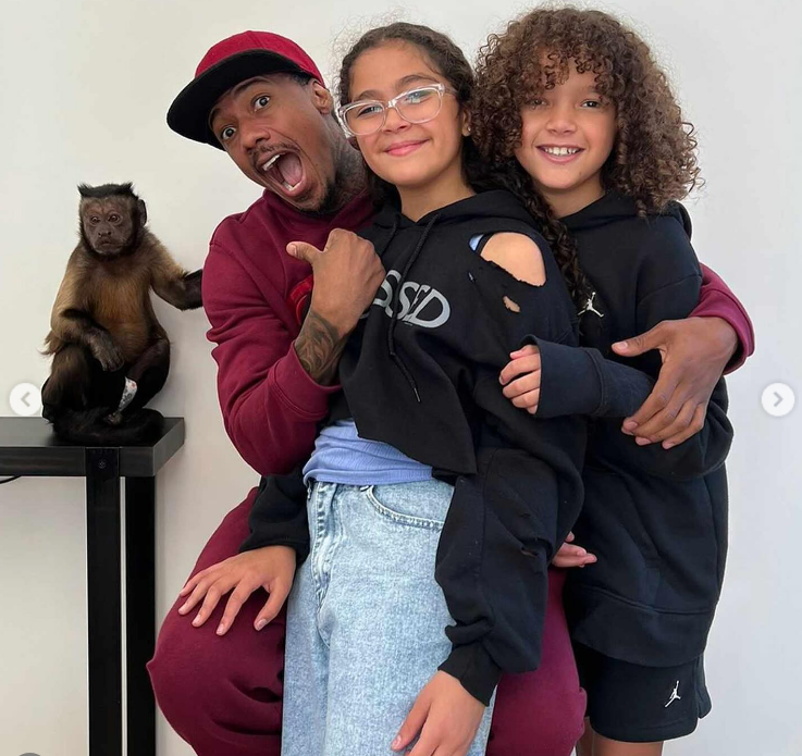 Monroe Cannon and Moroccan Cannon, aged 13, celebrate Father's Day with their father, Nick Cannon, in a photo shared on June 16, 2024. | Source: Instagram/monroecannon