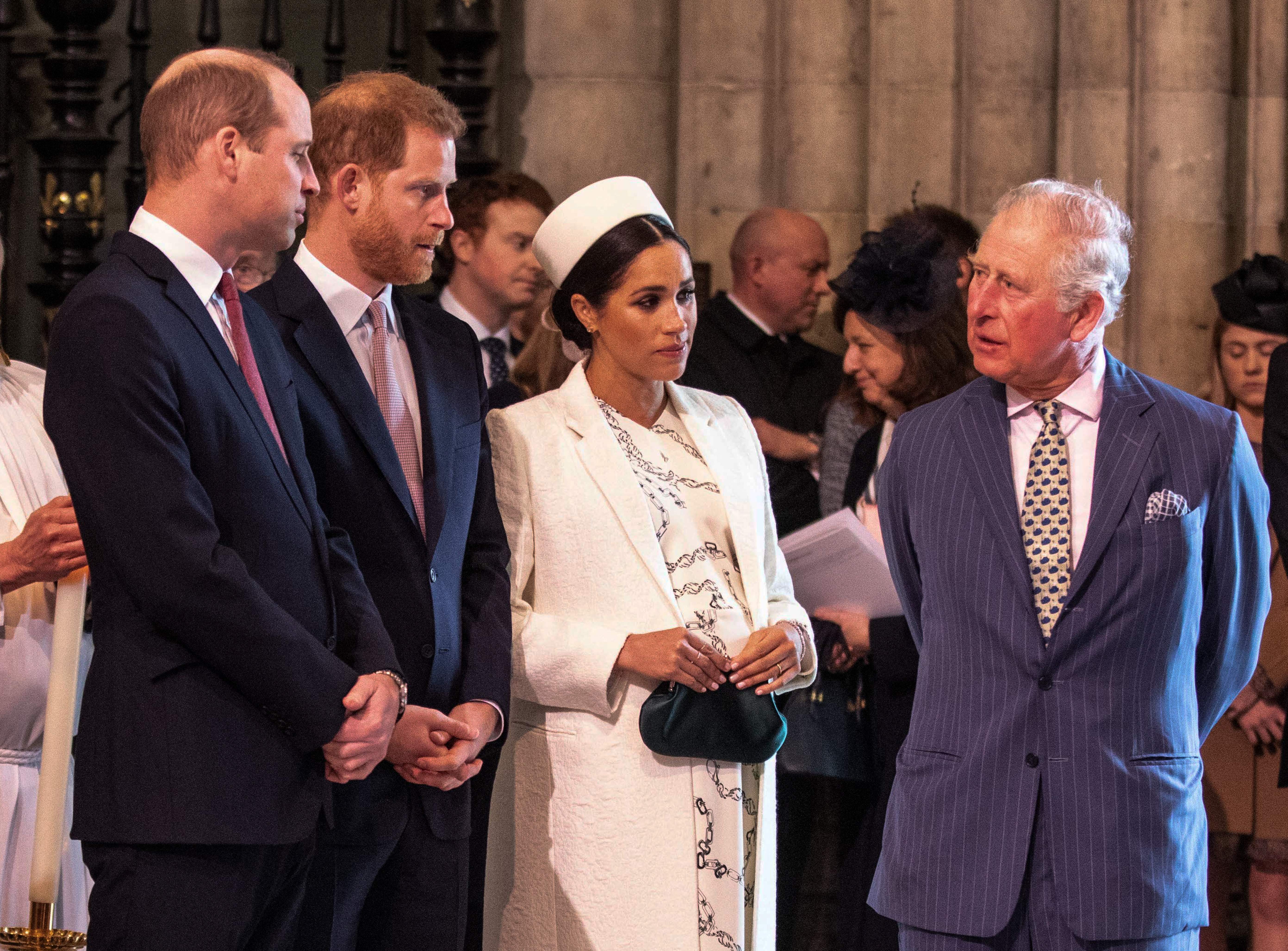 Prince William, Prince Harry, Meghan Markle, Duchess of Sussex, talk with King Charles III as they attend the Commonwealth Day service on March 11, 2019 in Westminster Abbey, London | Source: Getty Images