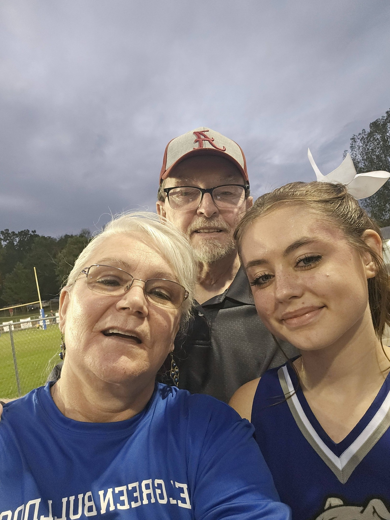 Timothy Clutts and Sheri Mitchell-Clutts with their granddaughter Allison in a post celebrating her birthday on December 8, 2024 | Source: Facebook/Sheri Mitchell-Clutts
