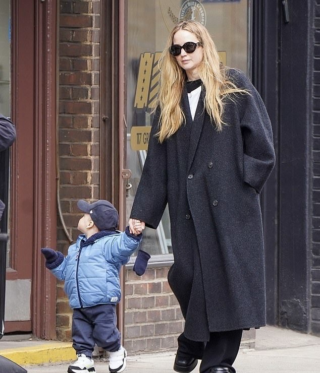 Lawrence has spoken about wanting her sons to enjoy ordinary childhood experiences, despite the photographers who sometimes follow the family during everyday outings. | Source: Getty Images