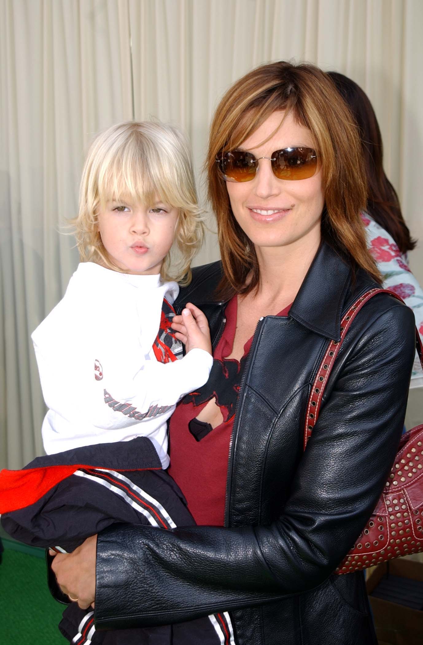 Presley Gerber attends the 2002 premiere of Spirit: Stallion of the Cimarron with his mother, Cindy Crawford, as a young child beginning to grow up in the public eye. | Source: Getty Images