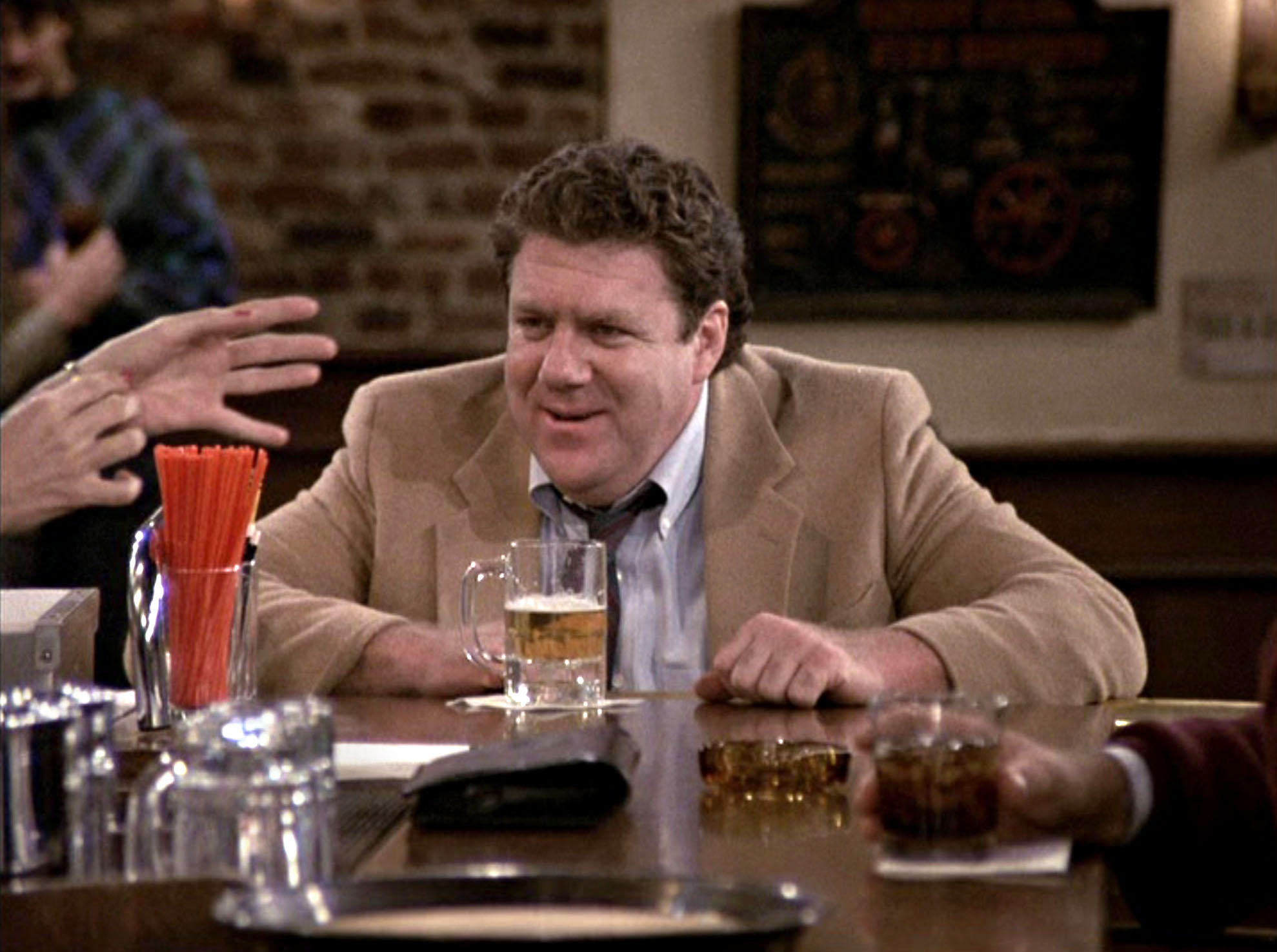 George Wendt appears as Norm Peterson in the "Cheers" episode "The Improbable Dream: Part 2," originally aired September 28, 1989 | Source: Getty Images